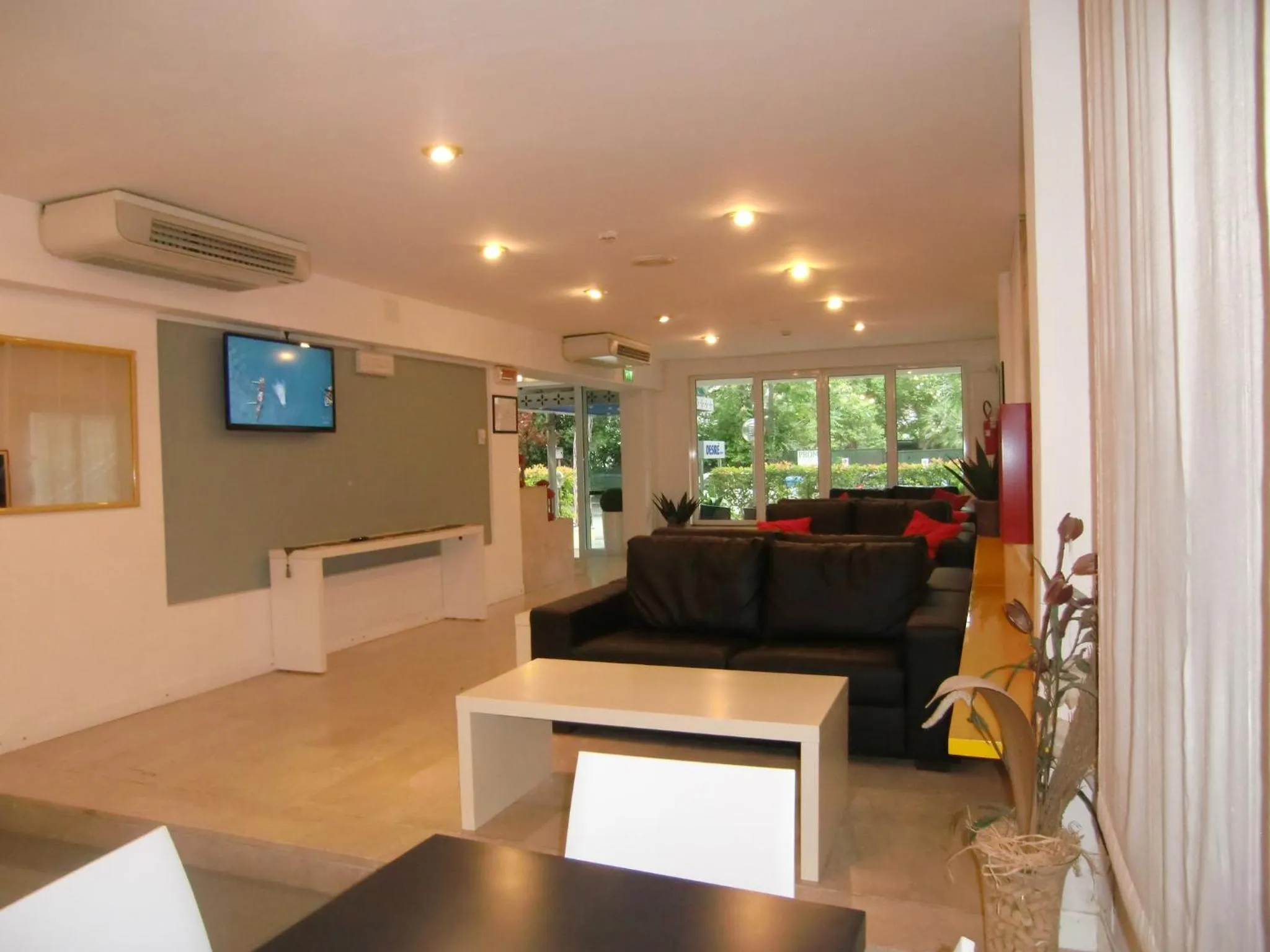 Communal lounge/ TV room in Hotel Desire'