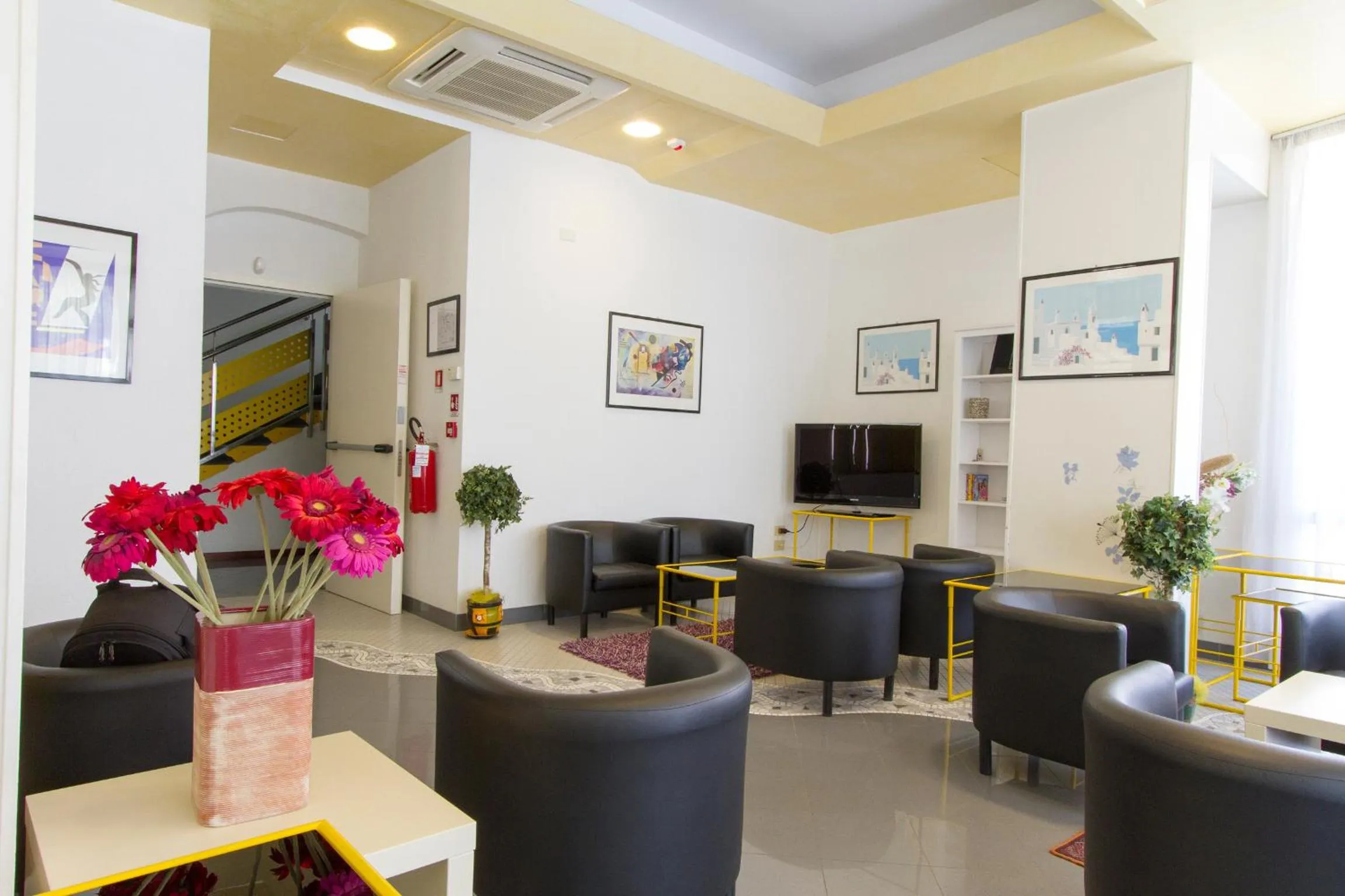 Communal lounge/ TV room in Hotel Desire'