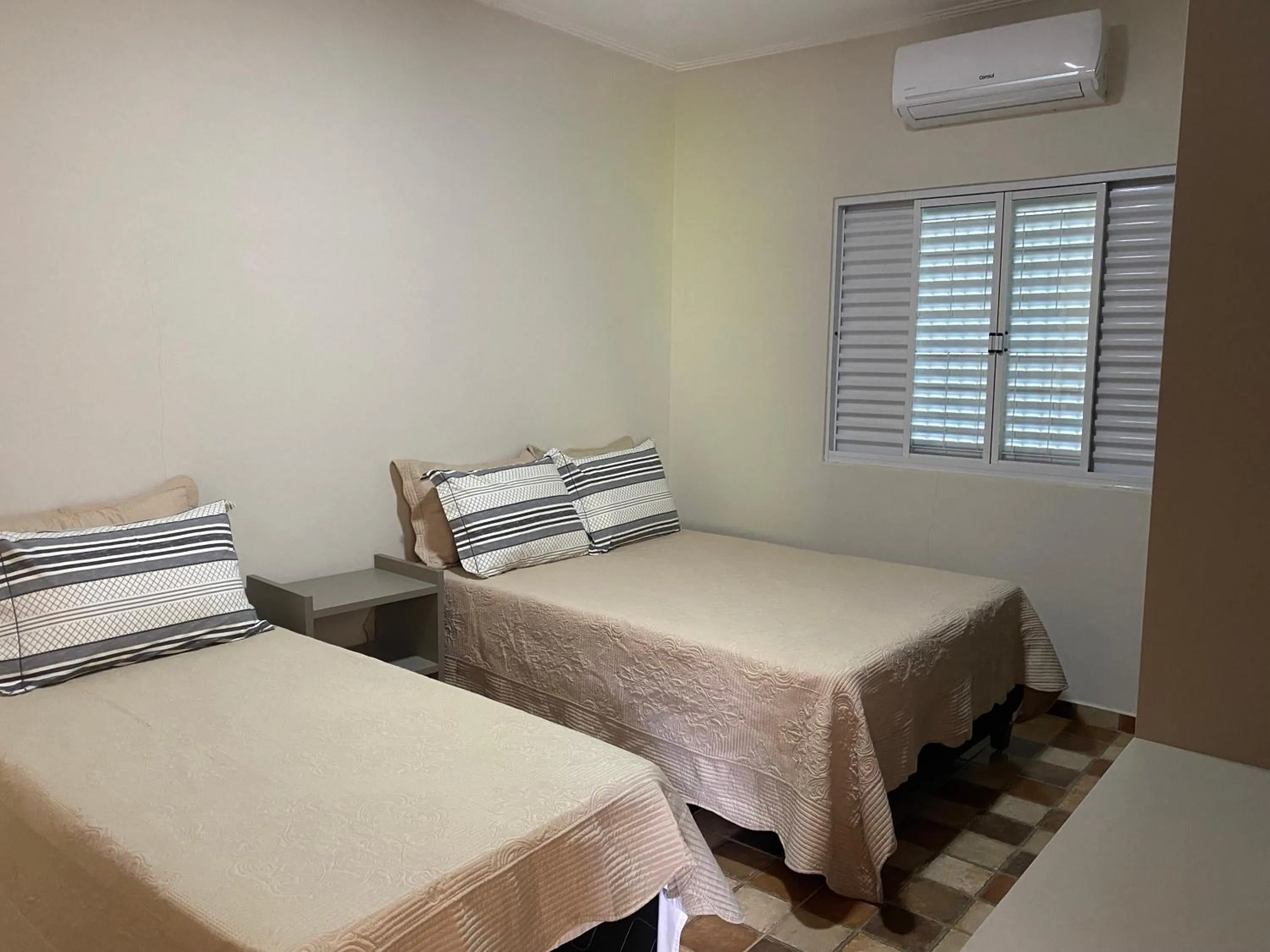 Bed in Pousada Dona Tereza