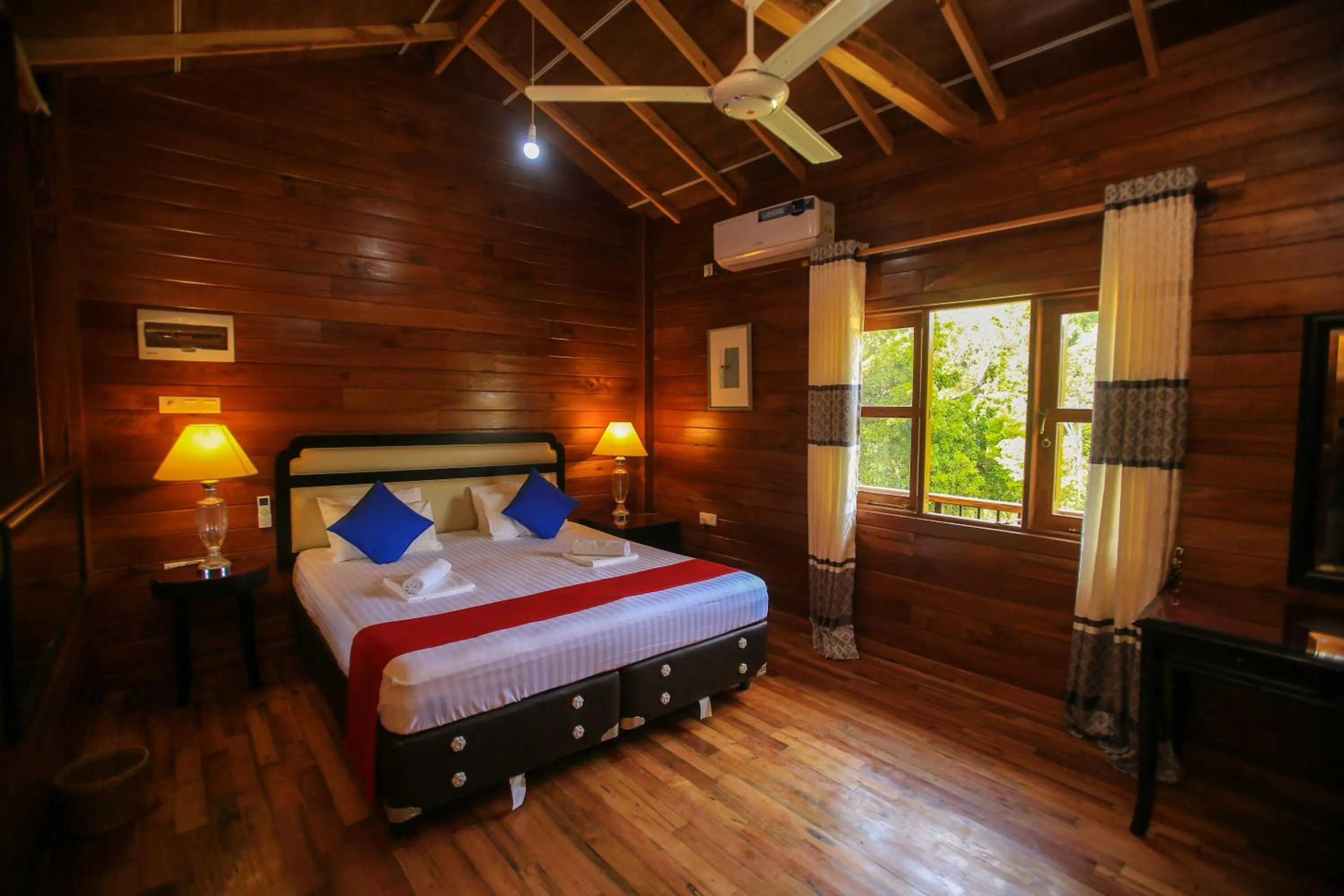 Bed in Jungle Hut Resort Sigiriya