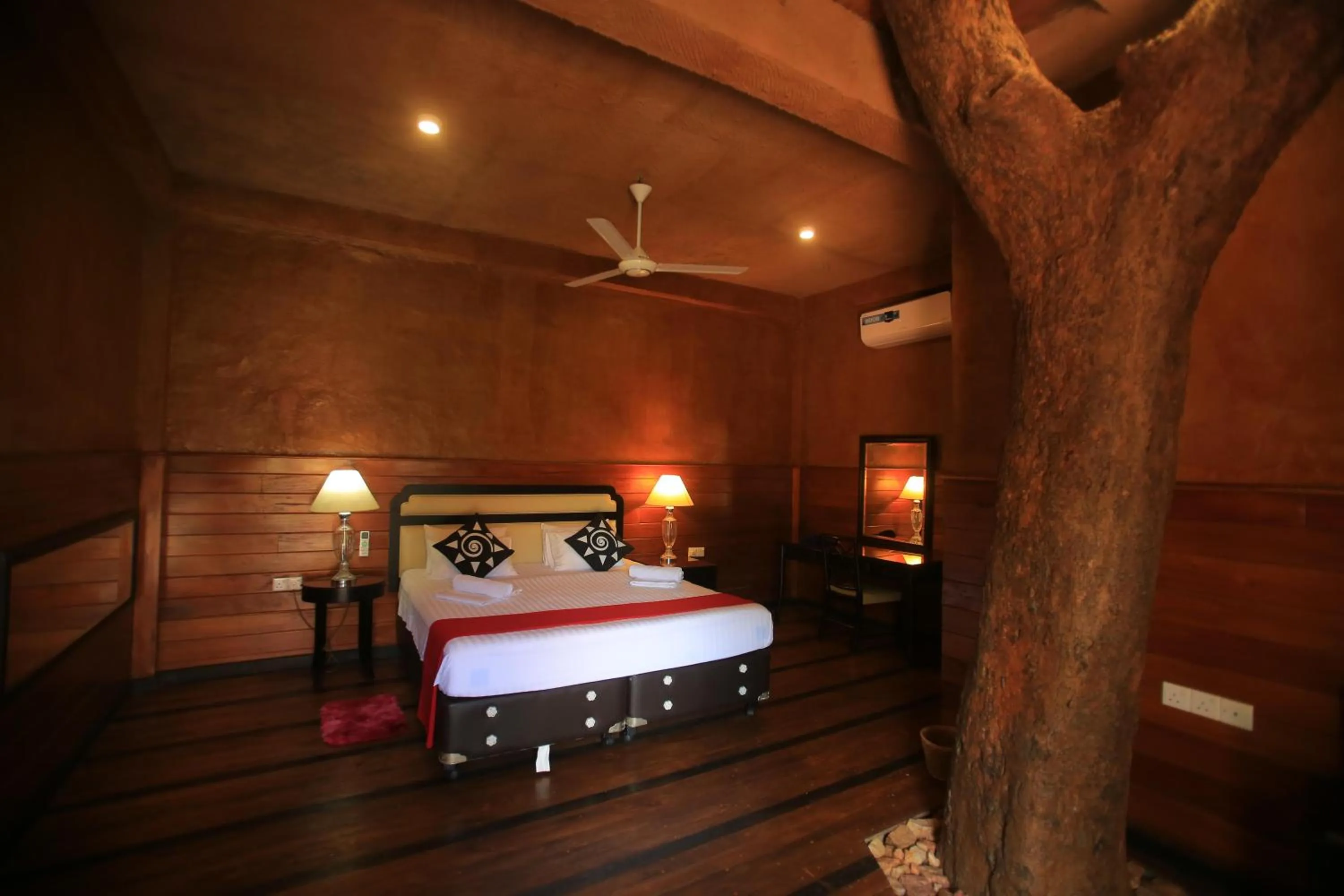 Bed in Jungle Hut Resort Sigiriya