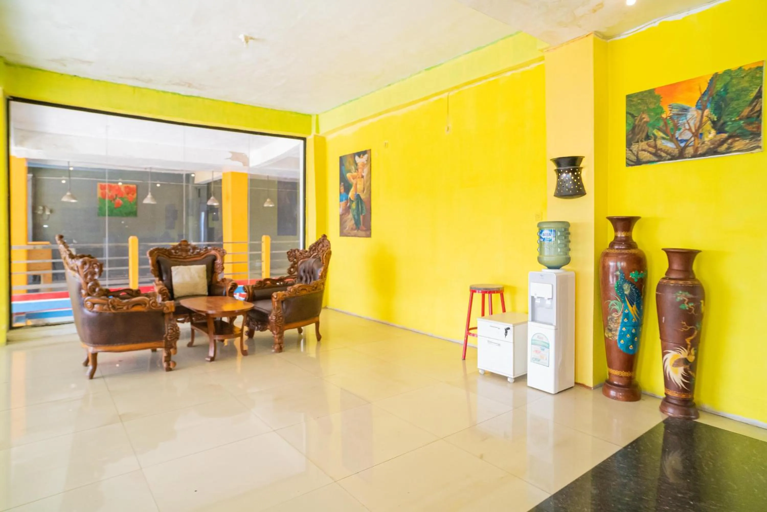 Seating area in RedDoorz @ Kampung Sawah Jatimurni Bekasi