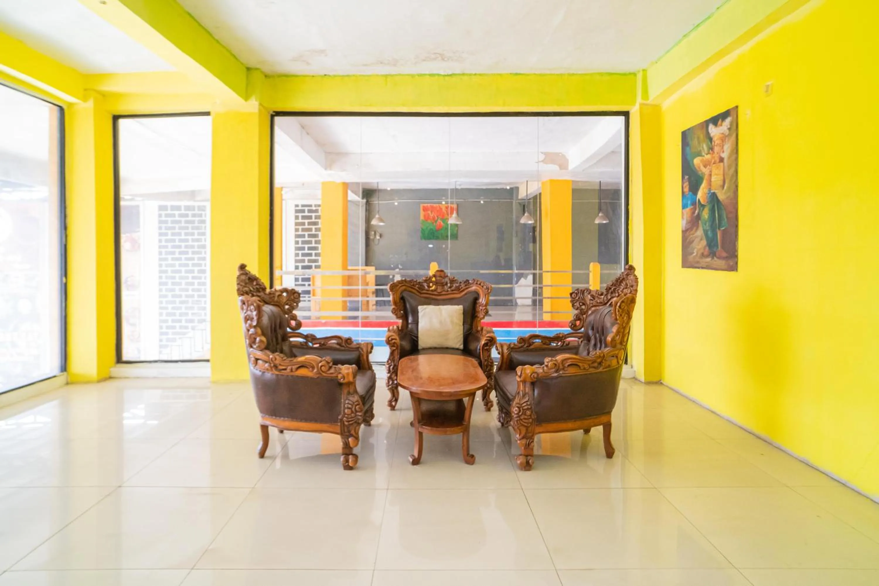 Seating area in RedDoorz @ Kampung Sawah Jatimurni Bekasi