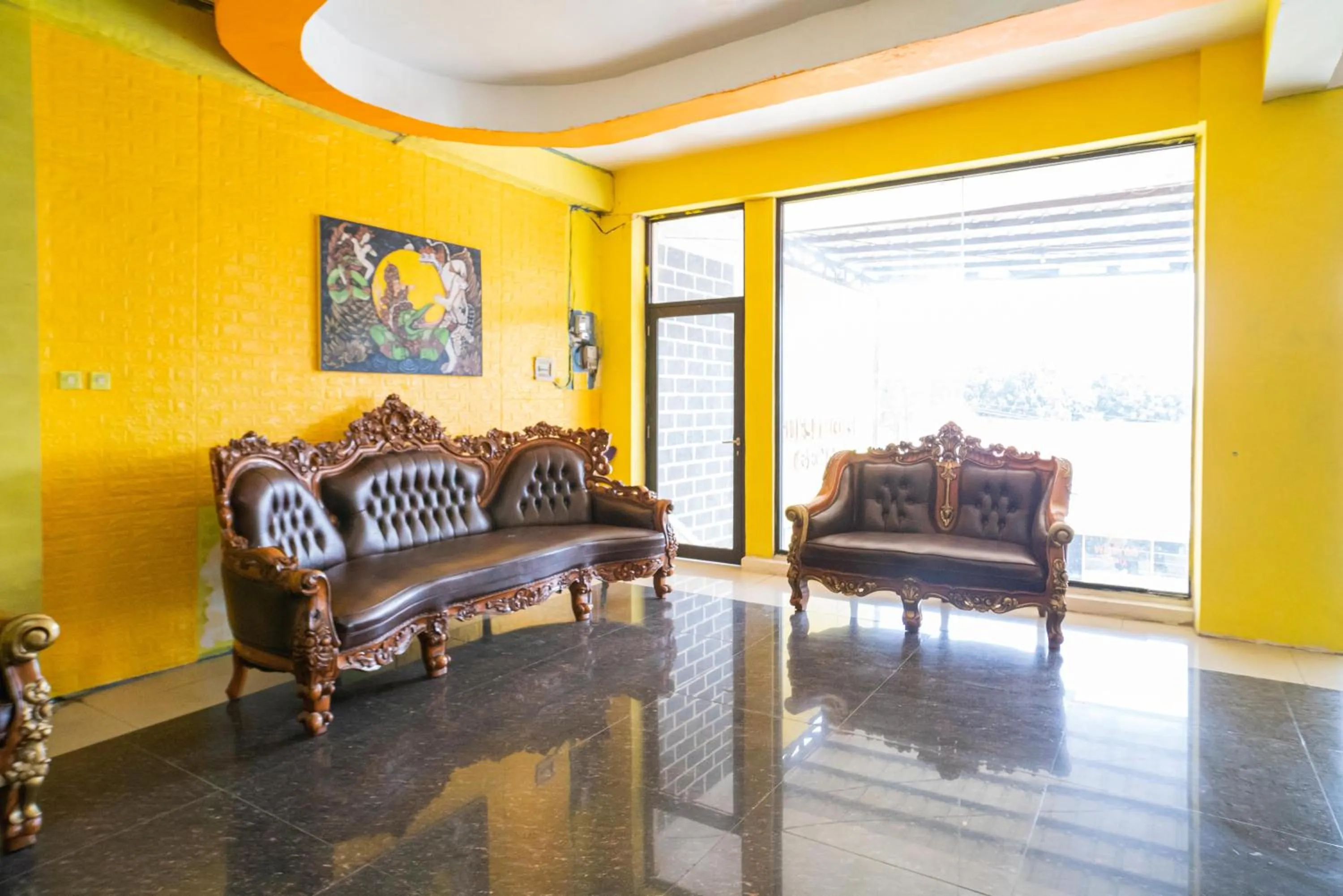 Seating area in RedDoorz @ Kampung Sawah Jatimurni Bekasi