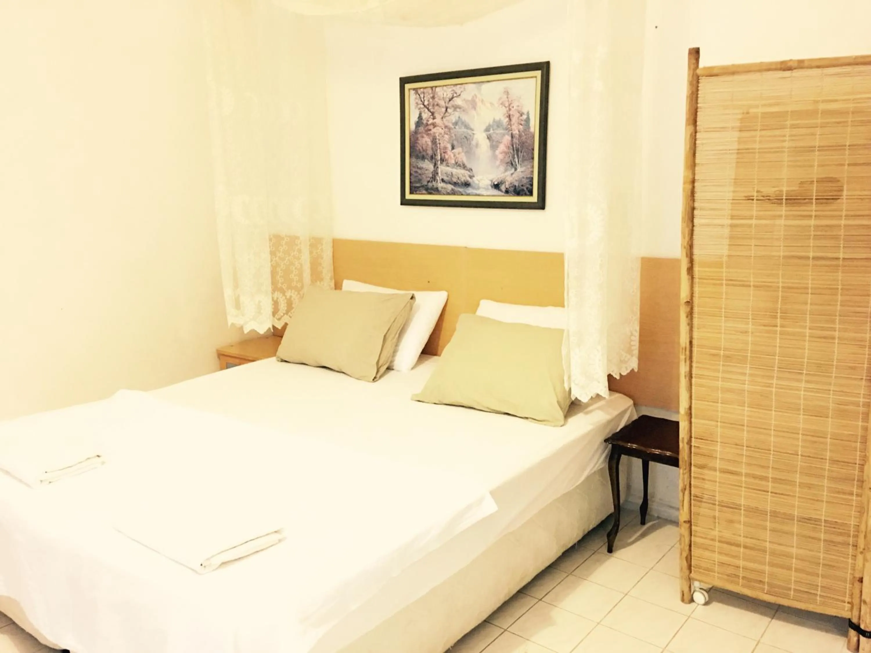 Bed in Mursel Garden Hotel