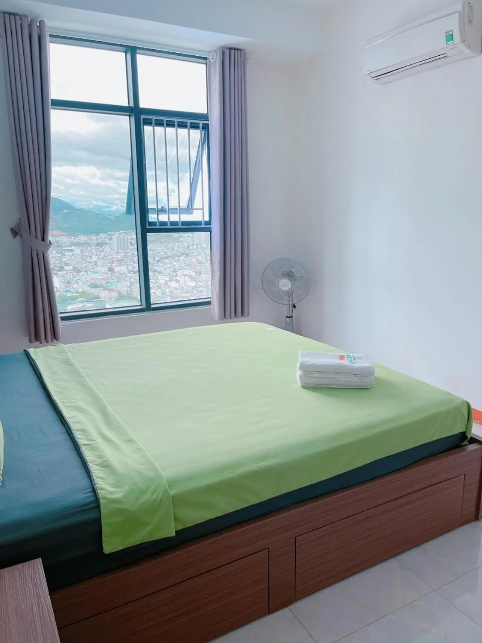 Bed in Pearl Nha Trang Beach Apartment