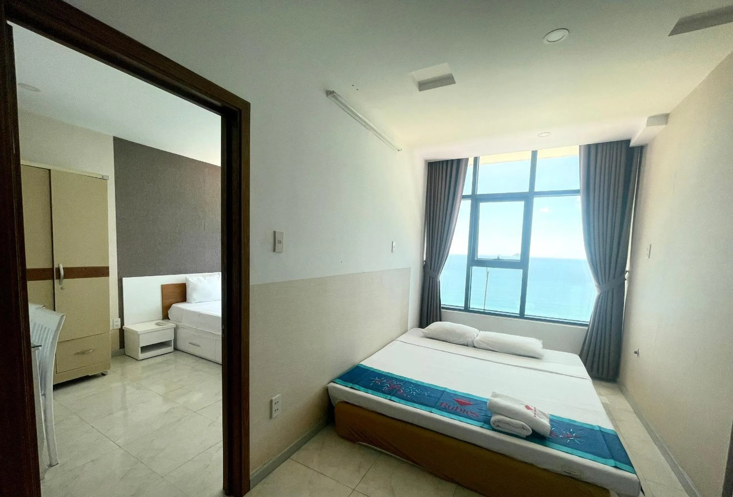 Bed in Pearl Nha Trang Beach Apartment