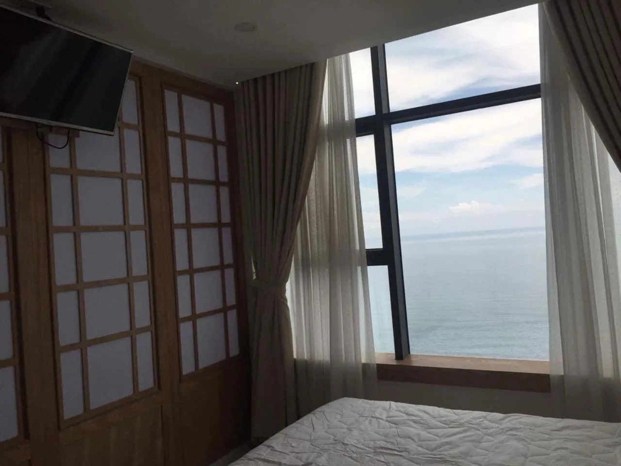 Bed in Pearl Nha Trang Beach Apartment