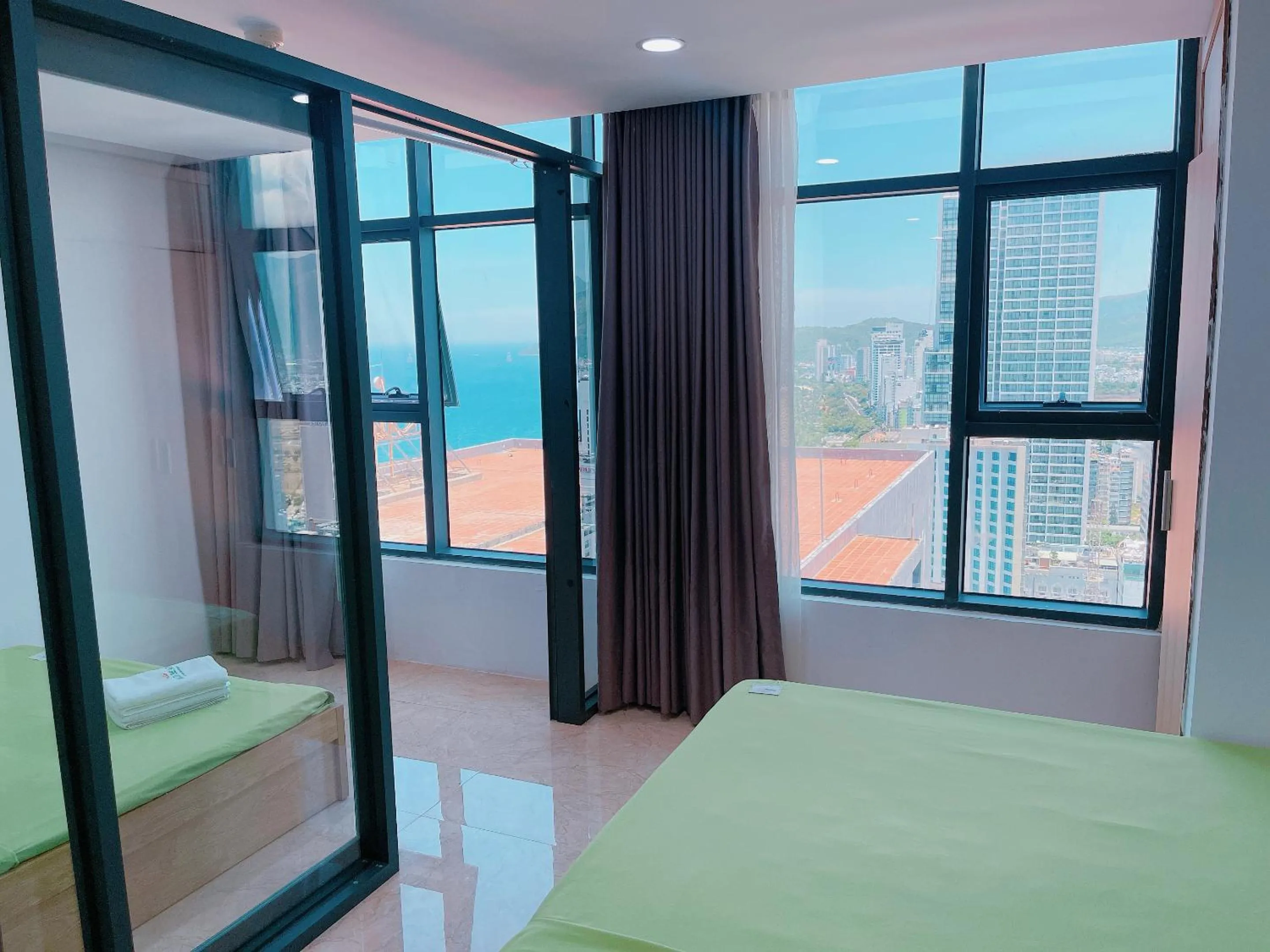 Natural landscape, Bed in Pearl Nha Trang Beach Apartment