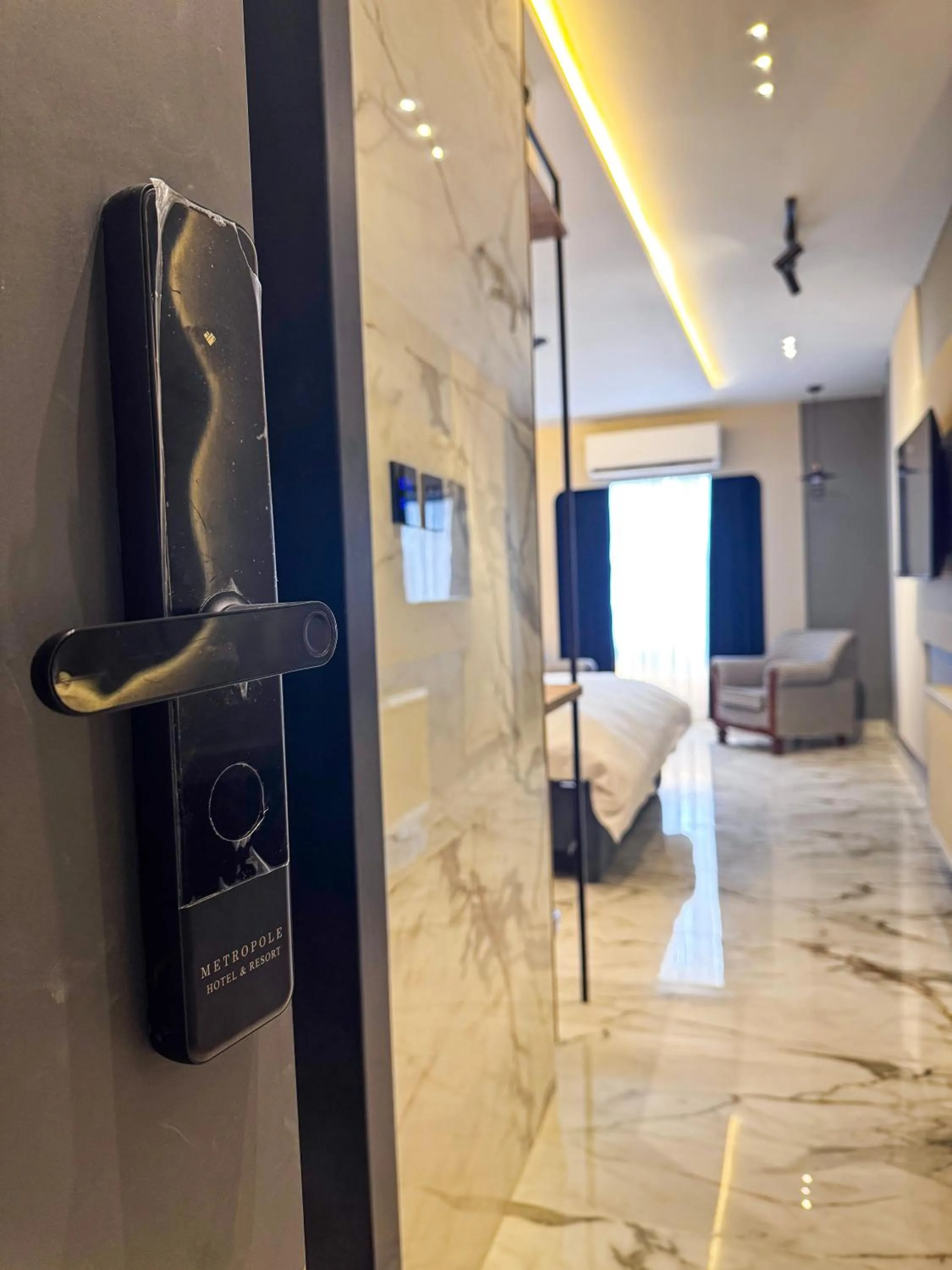 Bed in Metropole Hotel