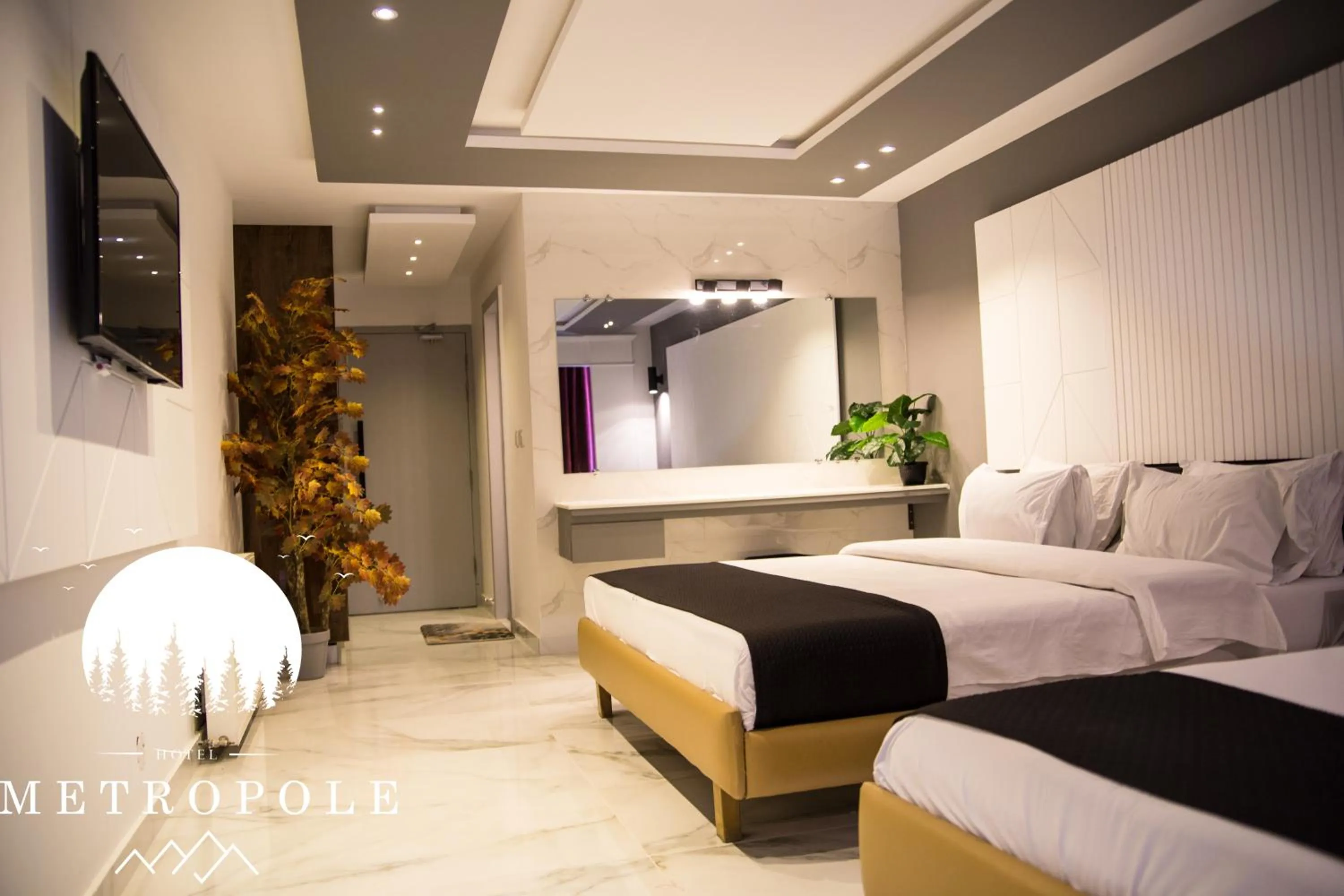 Bed in Metropole Hotel