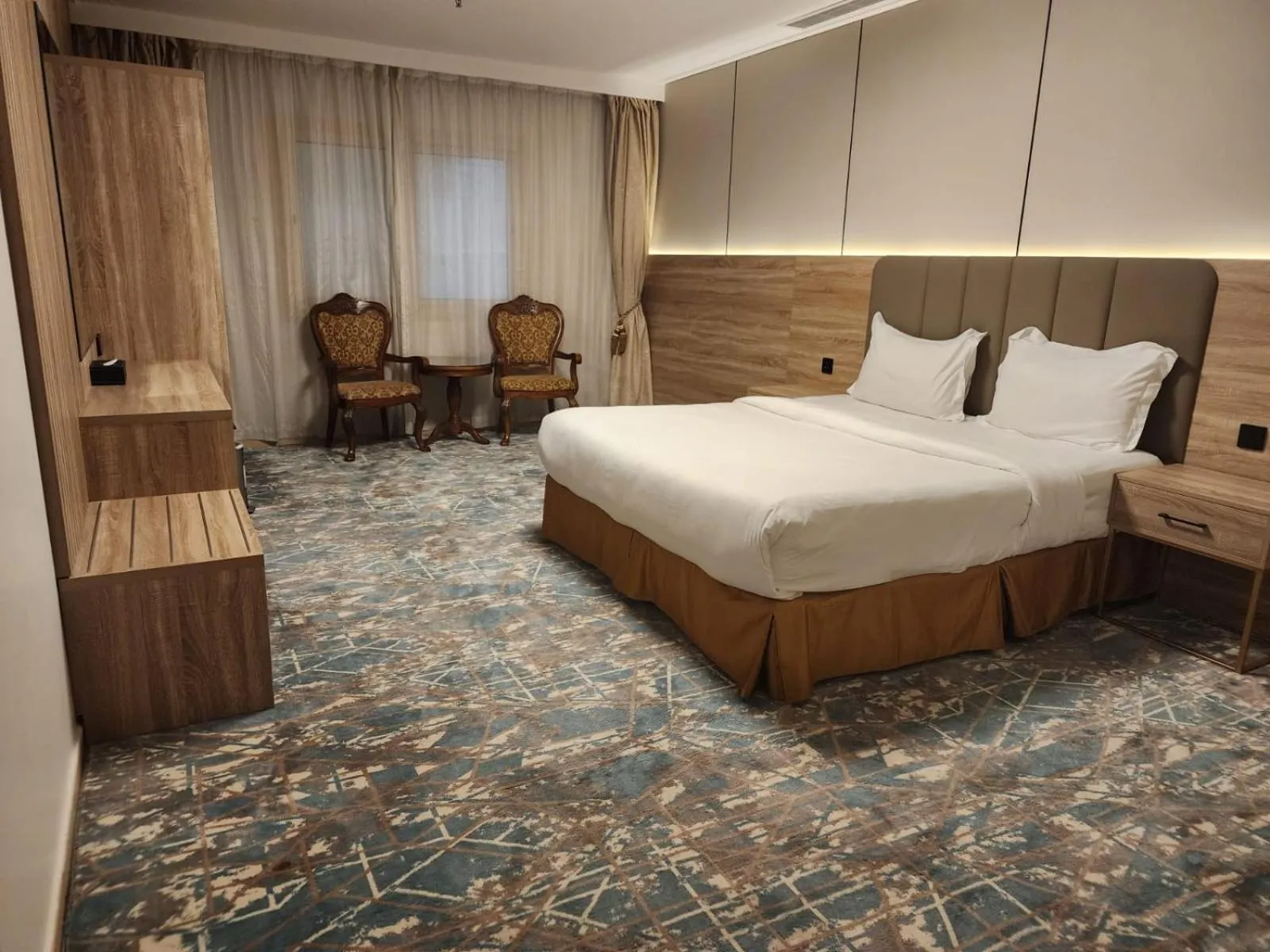 Bed in Sadeem Al Fajr Hotel Suites