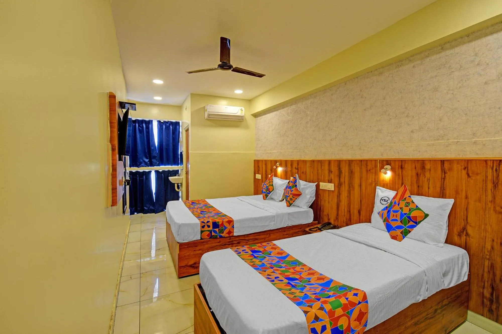 Bed in FabHotel S Continental