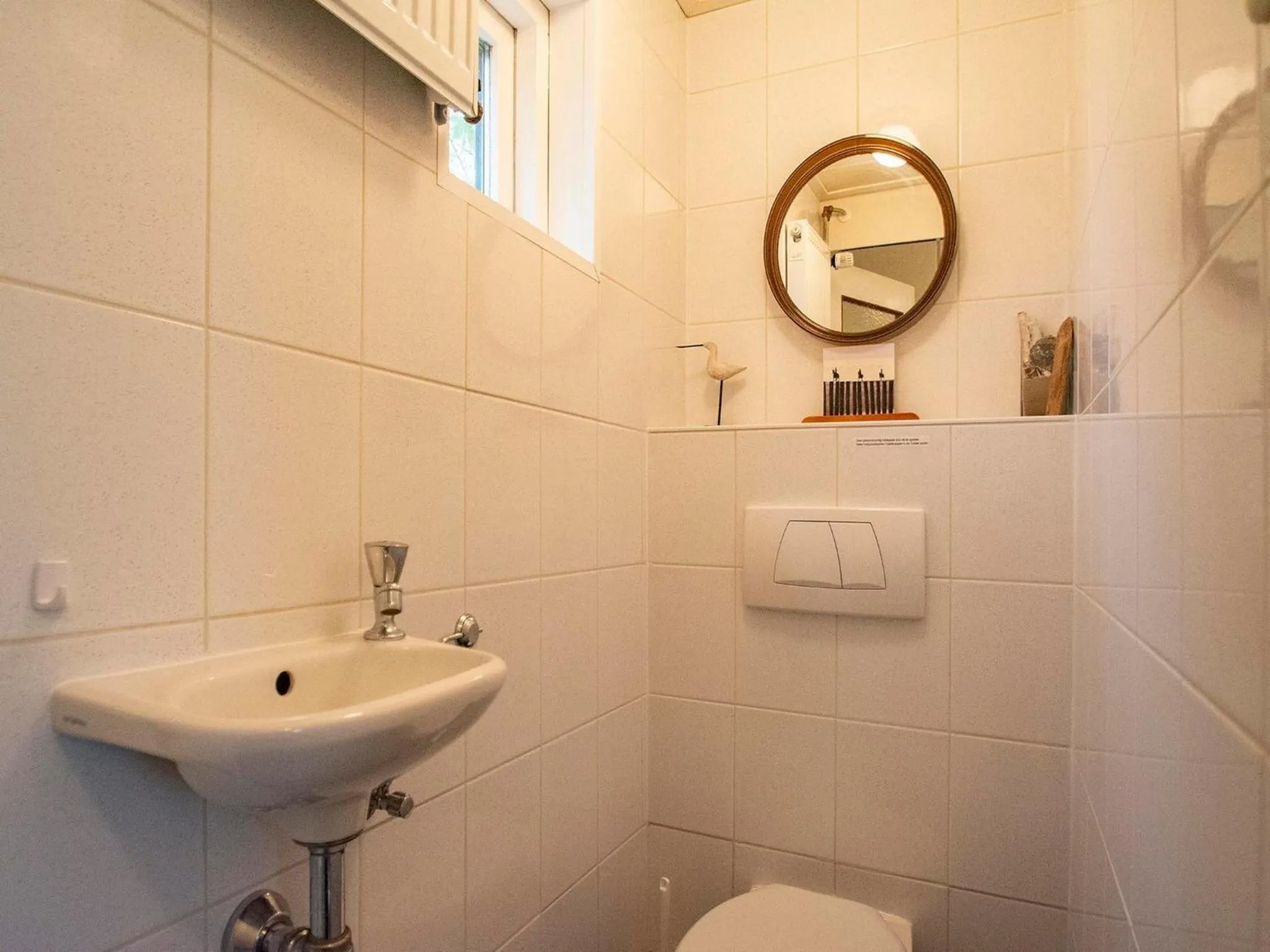 Bathroom in Bungalow near Dutch Beach & Family-Friendly Park