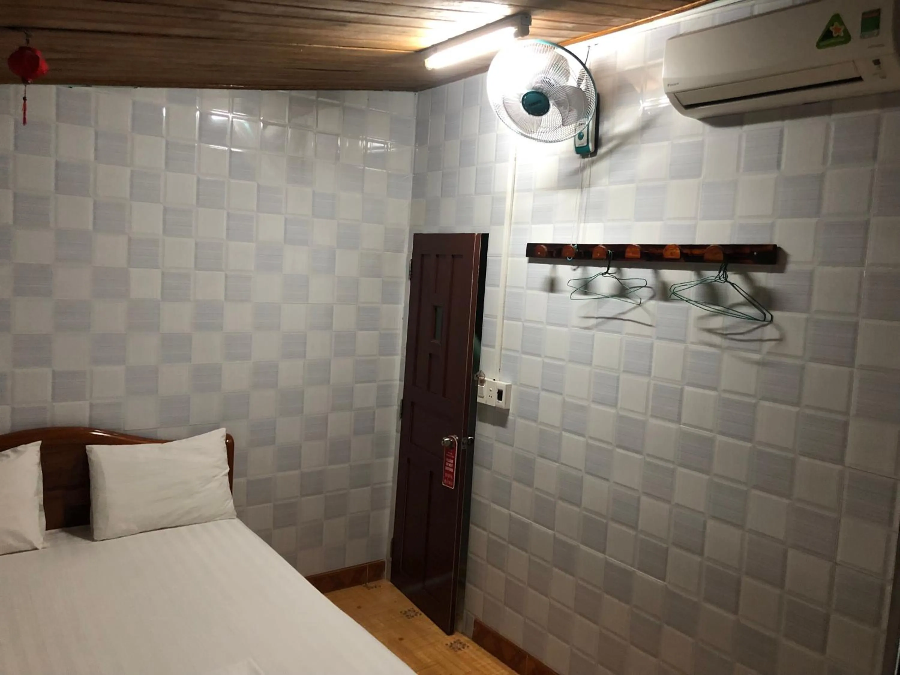 Photo of the whole room, Bed in Nha Lan Homestay