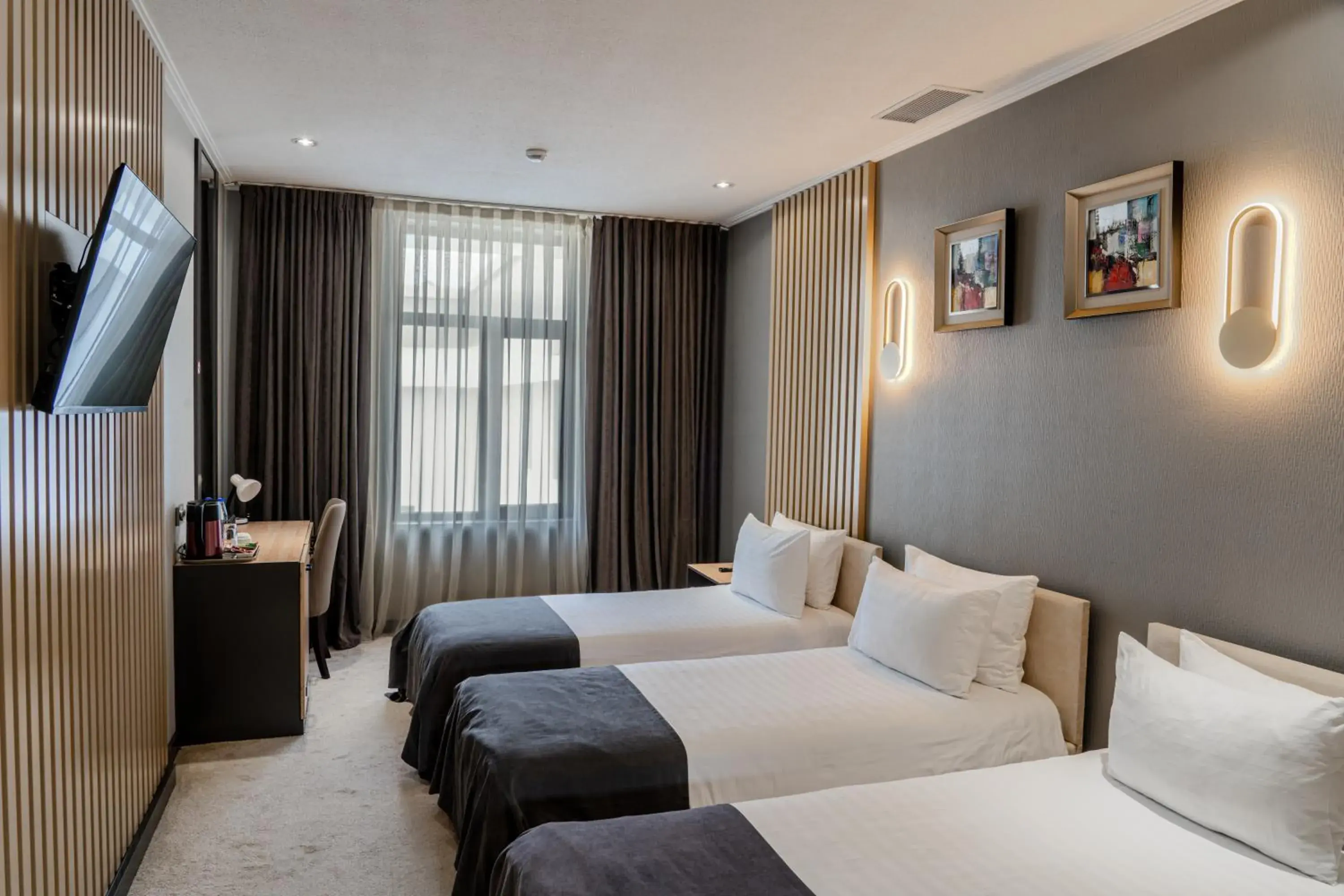 Standard Triple Room in HUSMA Hotel & Spa Standard Triple Room in HUSMA Hotel & Spa