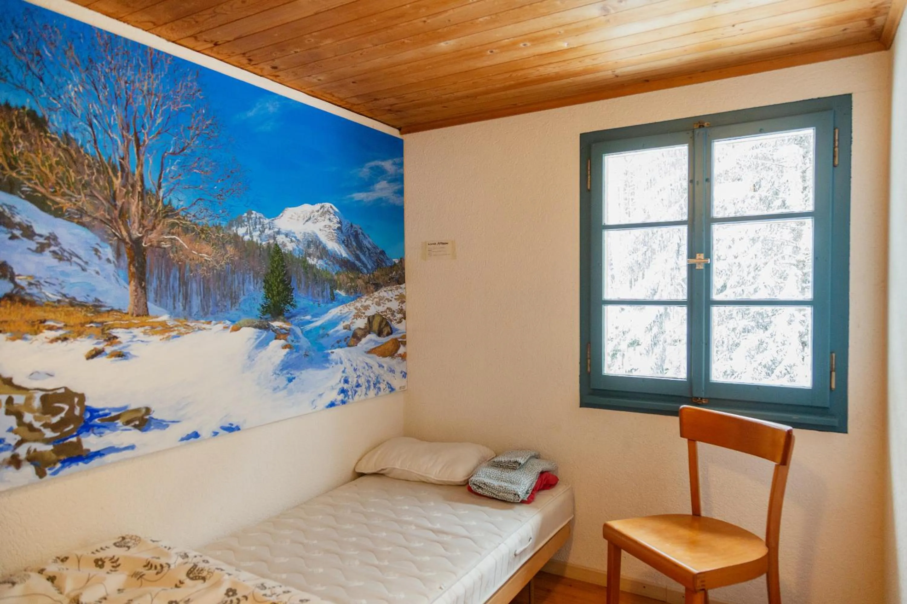 Bed in Kunst- und Naturfreundehaus Brünig