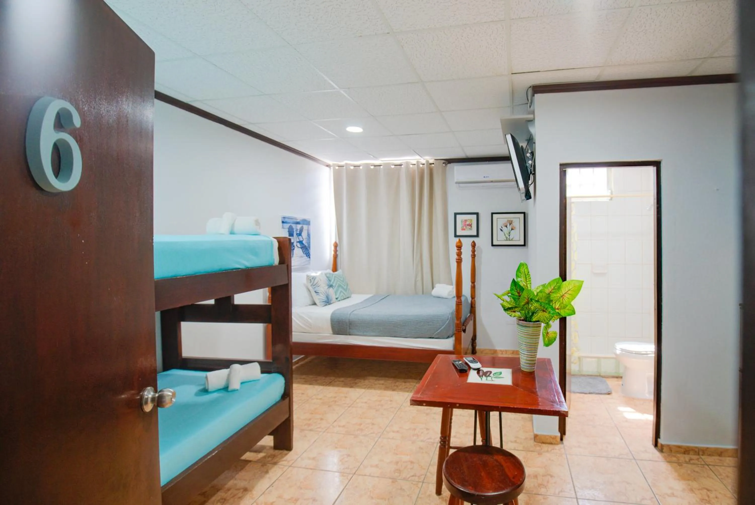 Bed in Wild Flowers Rooms