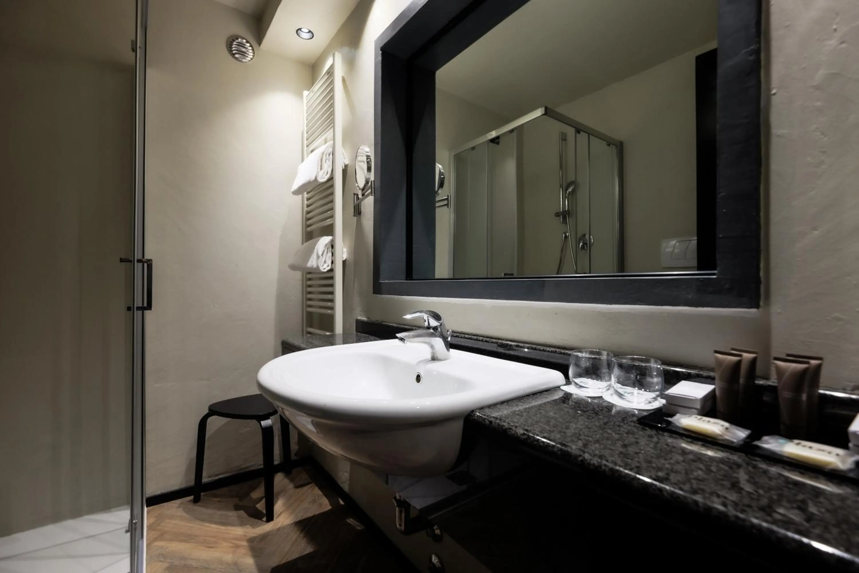 Bathroom in Plaza Hotel Abano Terme