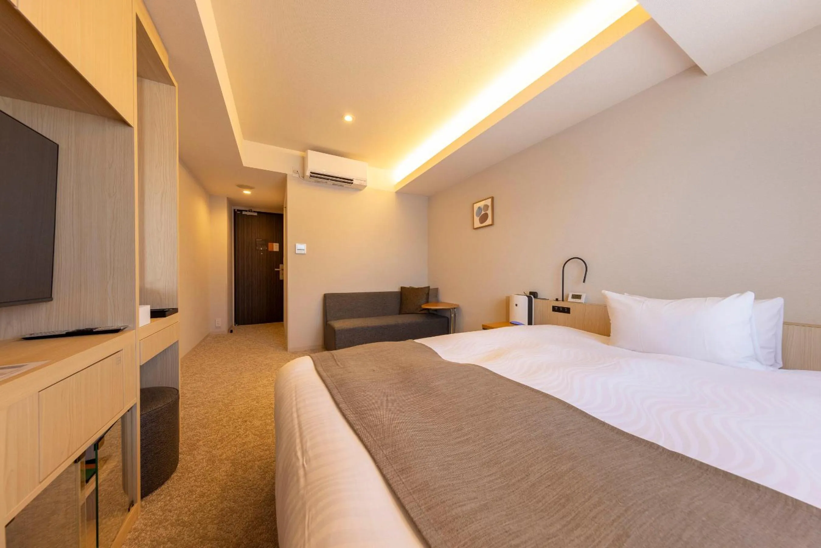 Bed in Hotel Granbinario Tsuruga