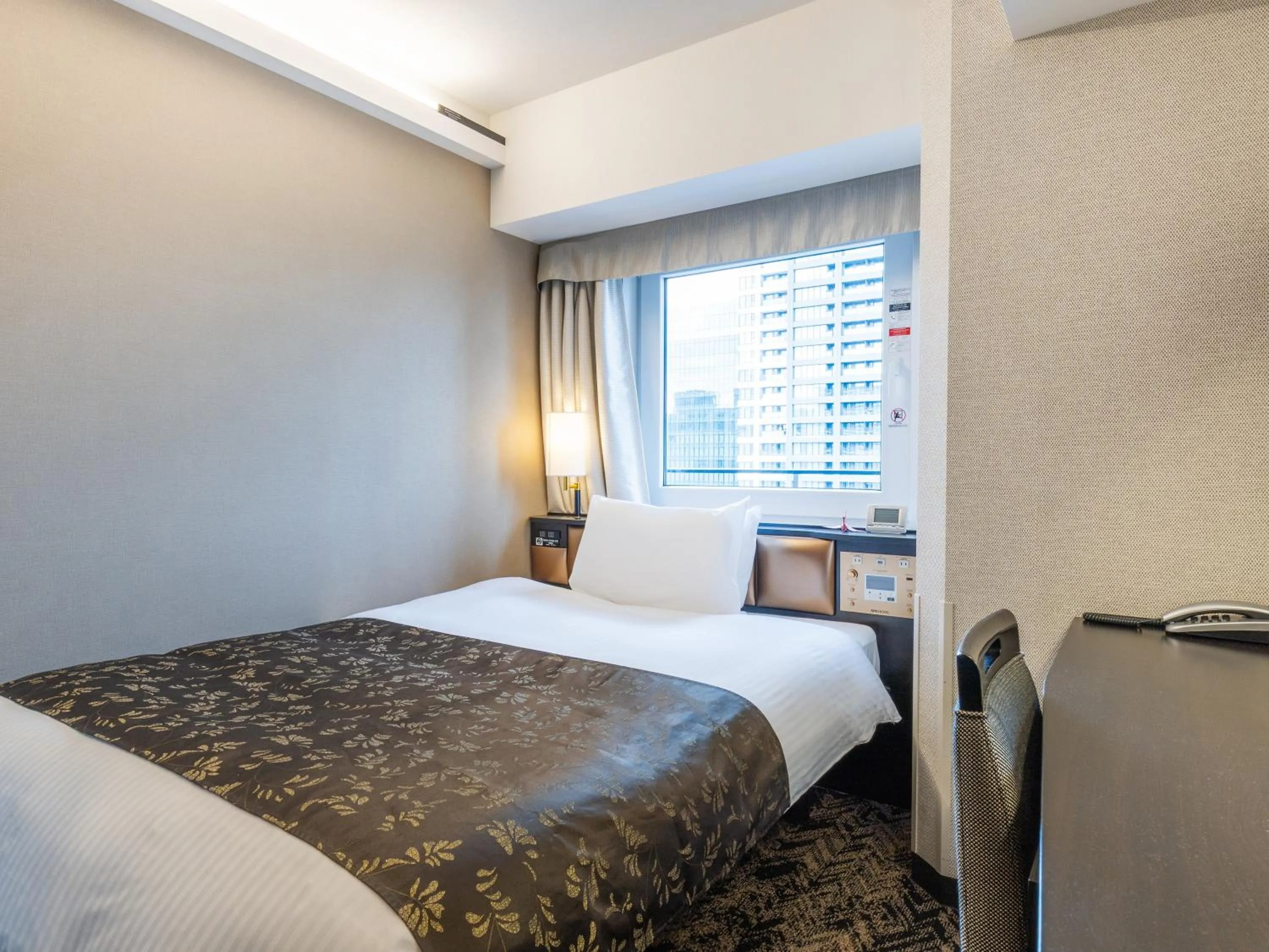 Photo of the whole room, Bed in APA Hotel & Resort Osaka Umeda Eki Tower