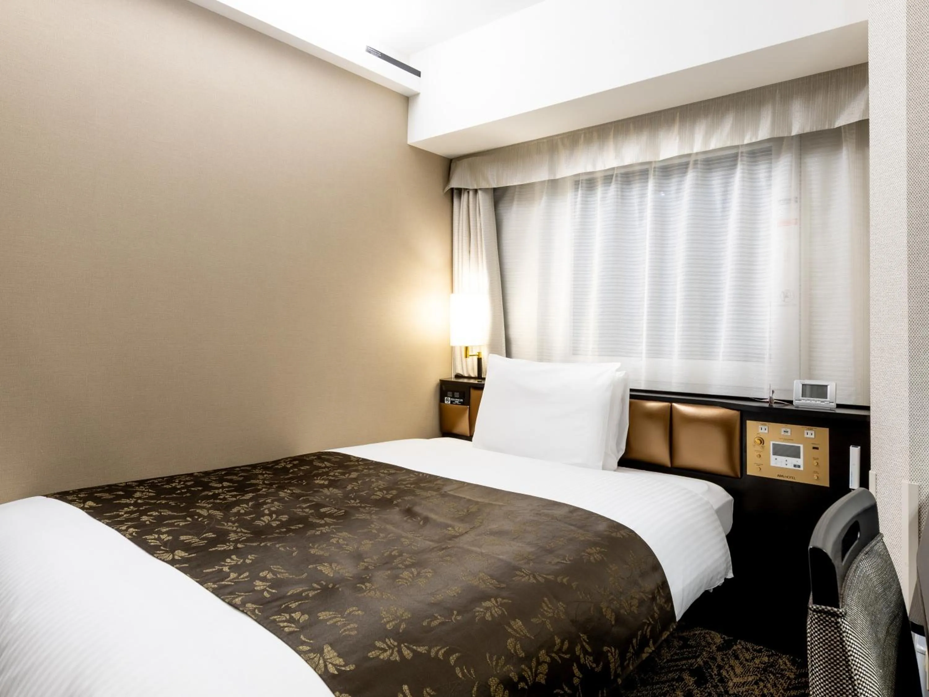 Photo of the whole room, Bed in APA Hotel & Resort Osaka Umeda Eki Tower