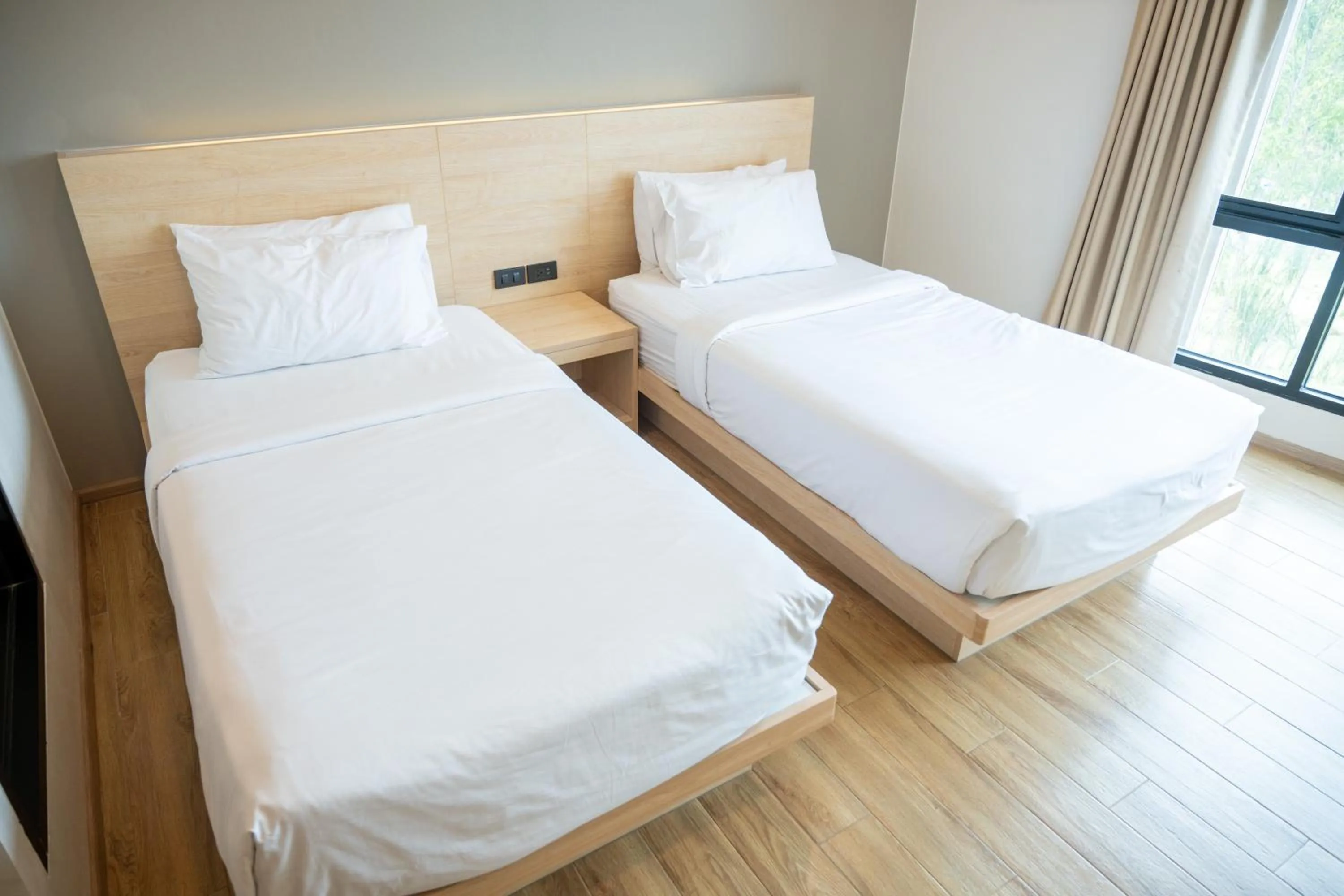 Bed in Mayuu Ayutthaya Hotel