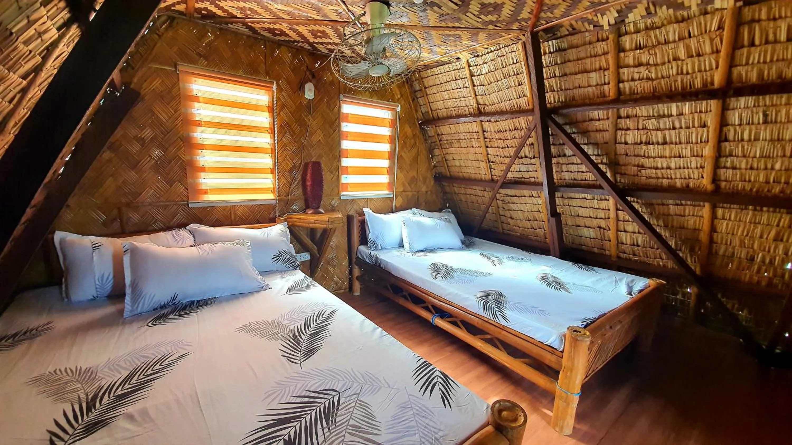 Bed in Calatagan's Bahay Kubo - with Beach Access