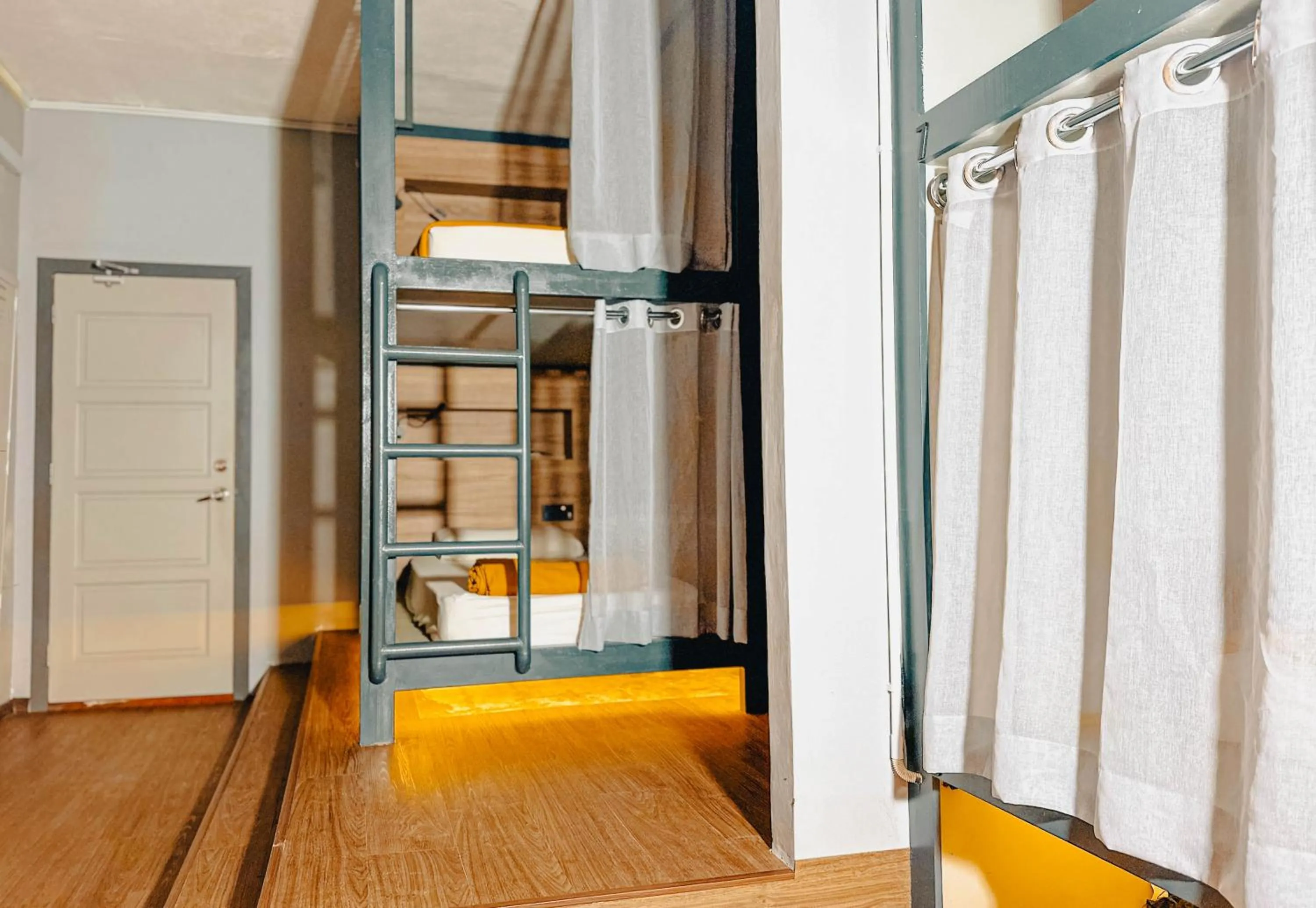 Bed in Arch Dormitorio Cenang