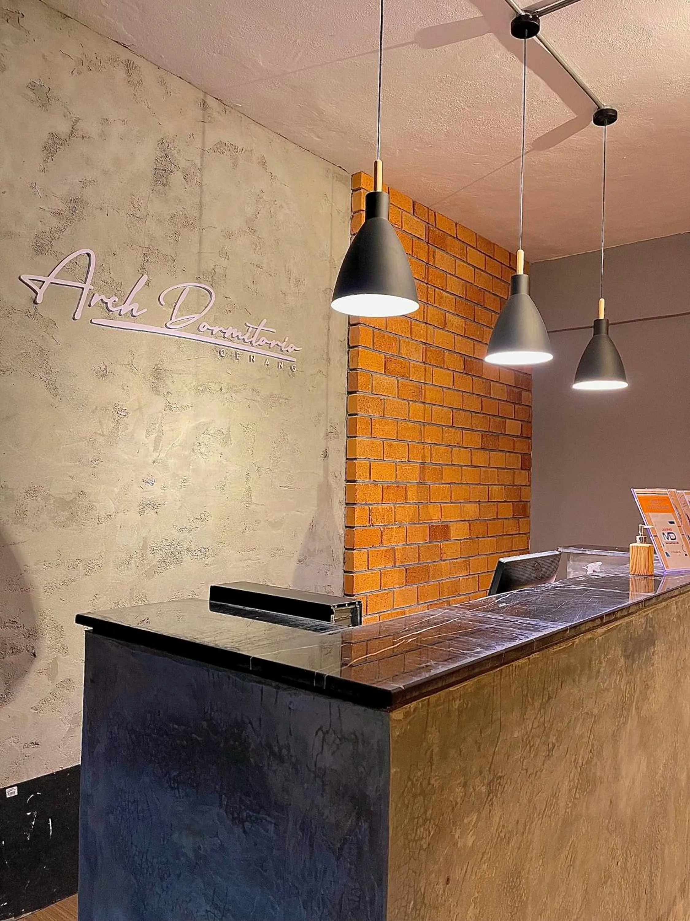 Property logo or sign in Arch Dormitorio Cenang