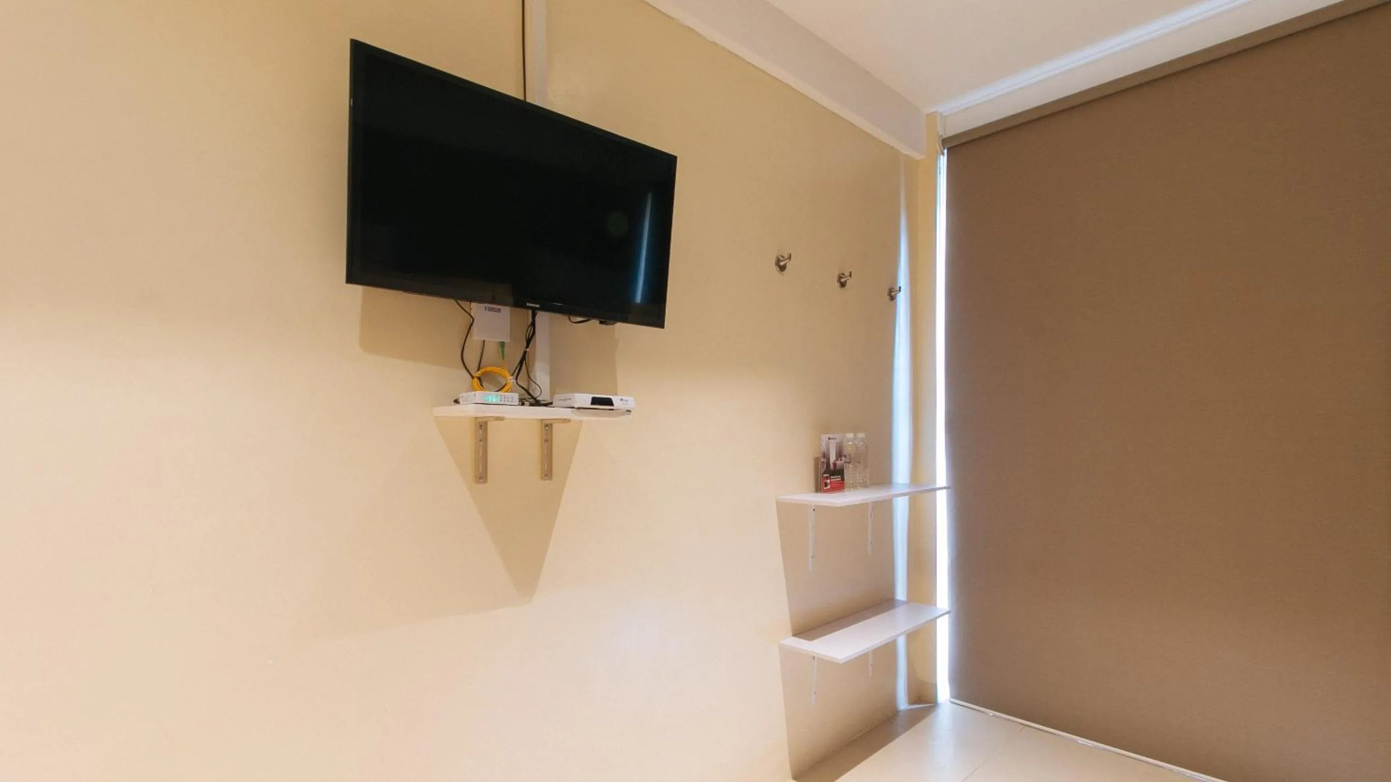 TV and multimedia in RedDooorz @ Laiya Vivo Hotel Batangas