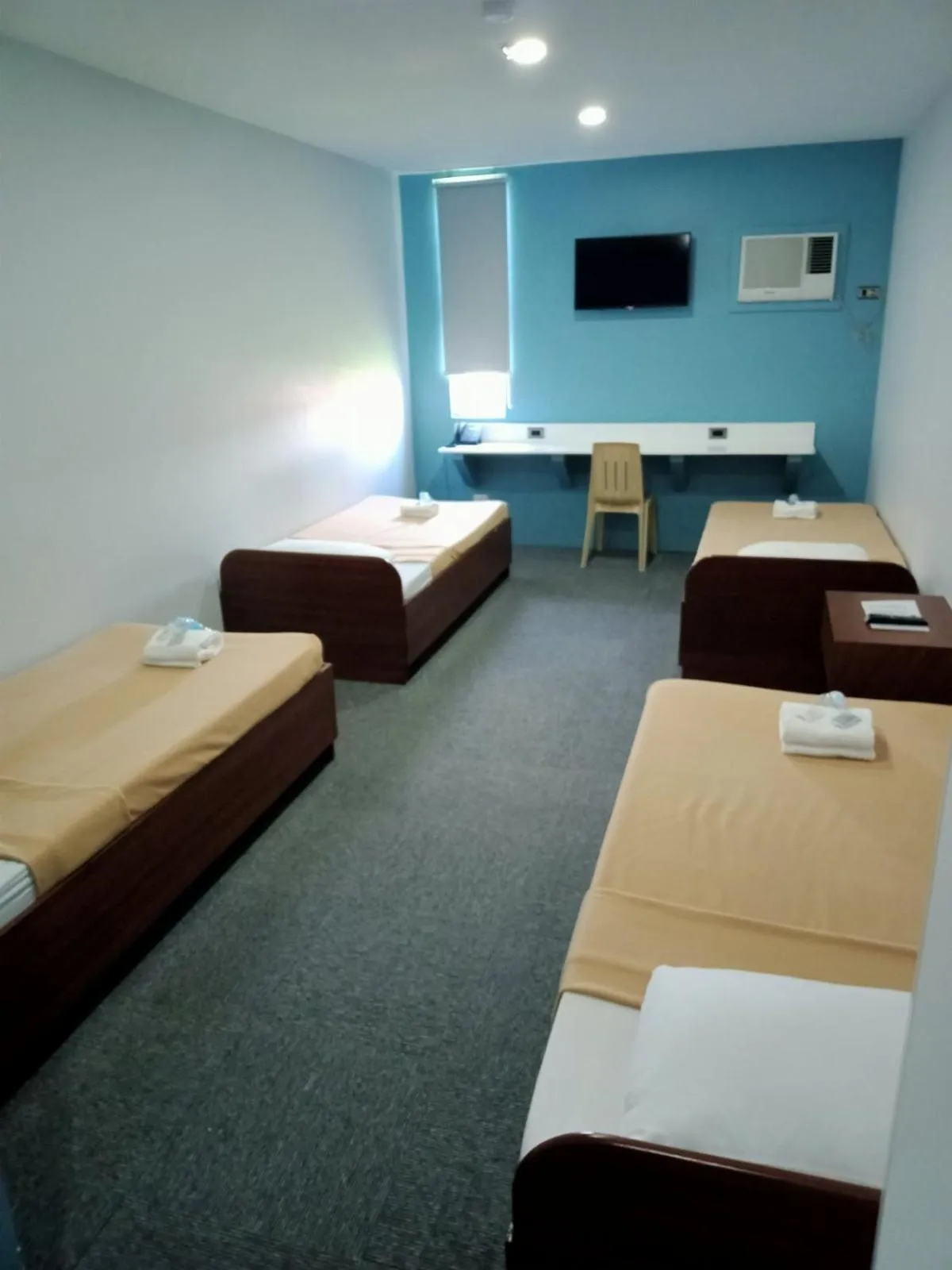 Bed in MADISON PARK HOTEL