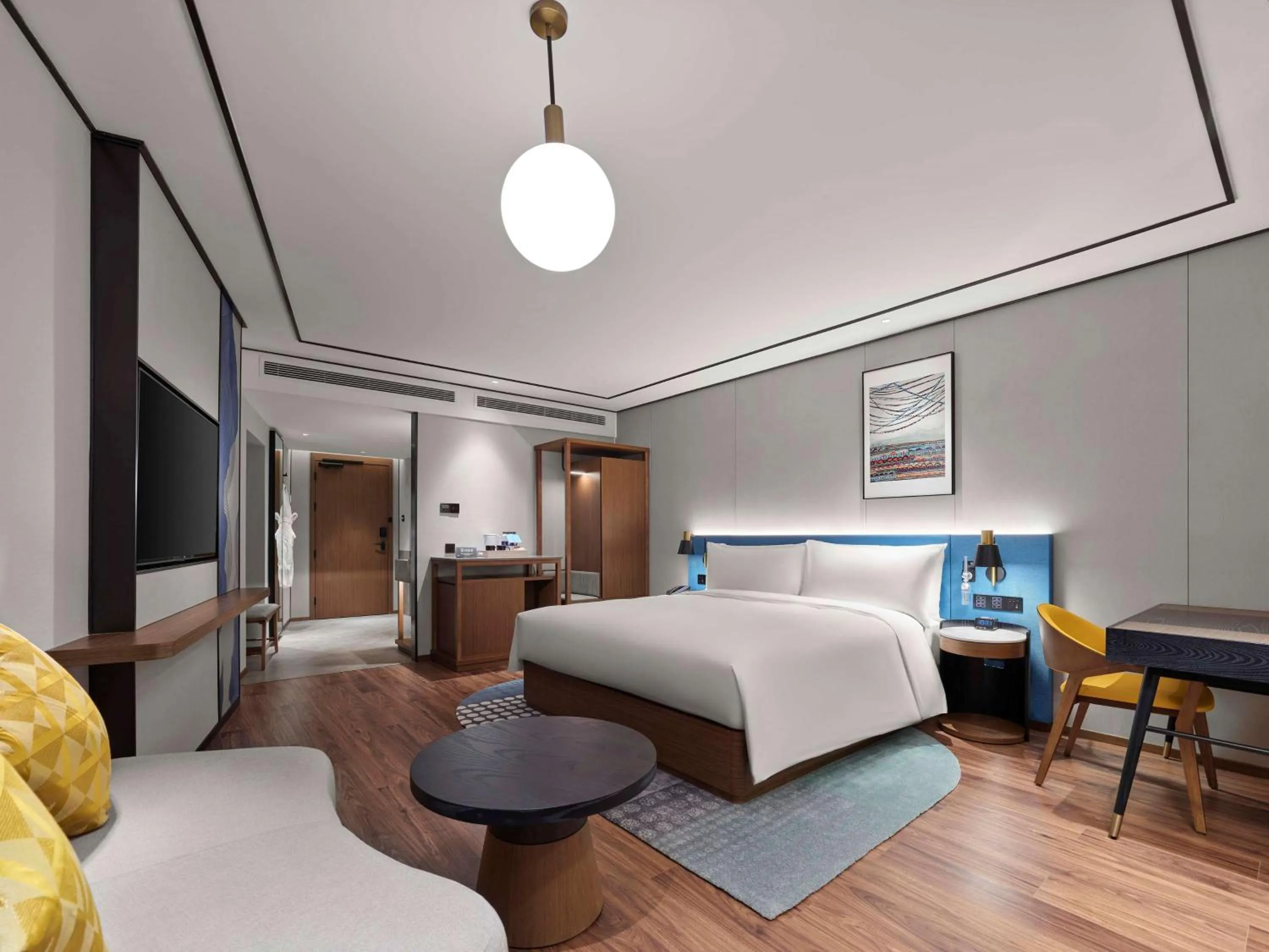 Living room, Bed in Hilton Garden Inn Lhasa