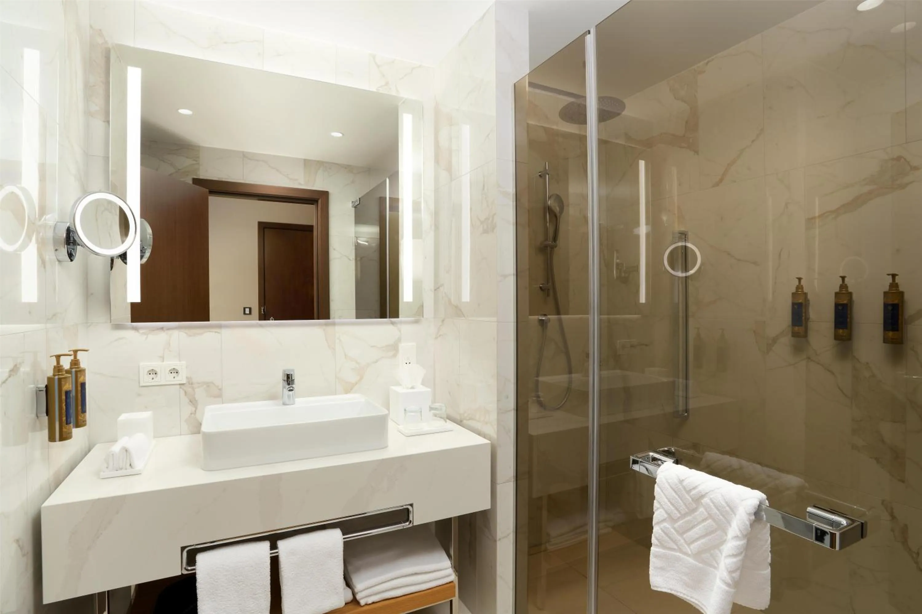 Bathroom in Iceland Parliament Hotel, Curio Collection By Hilton