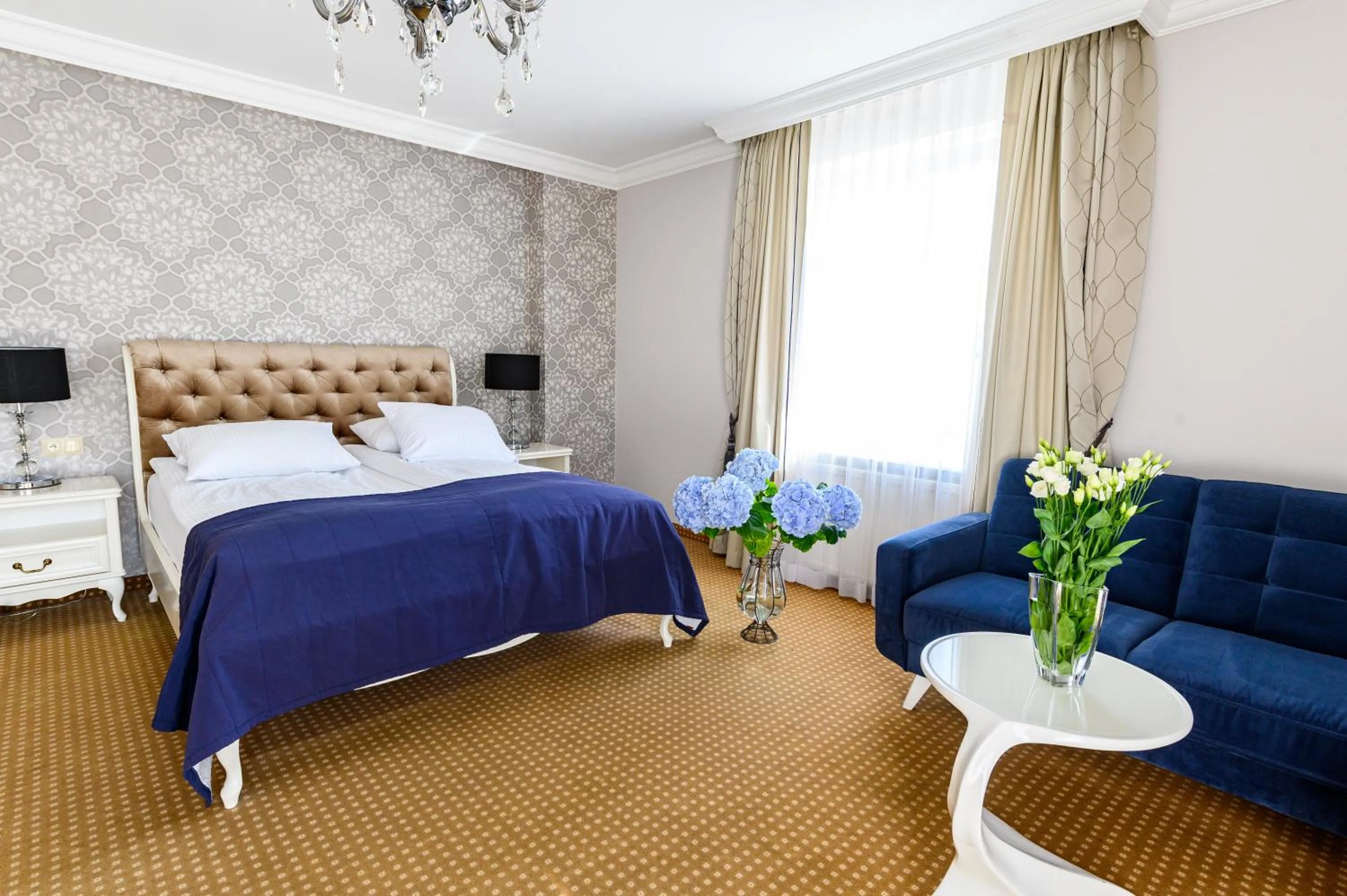 Bed in Moris Boutique Beach Hotel