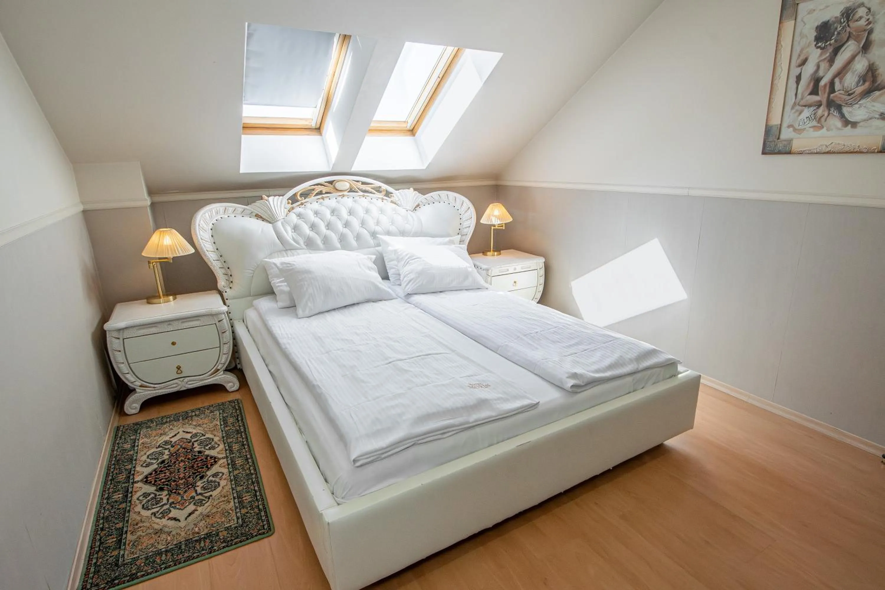 Bed in Moris Boutique Beach Hotel