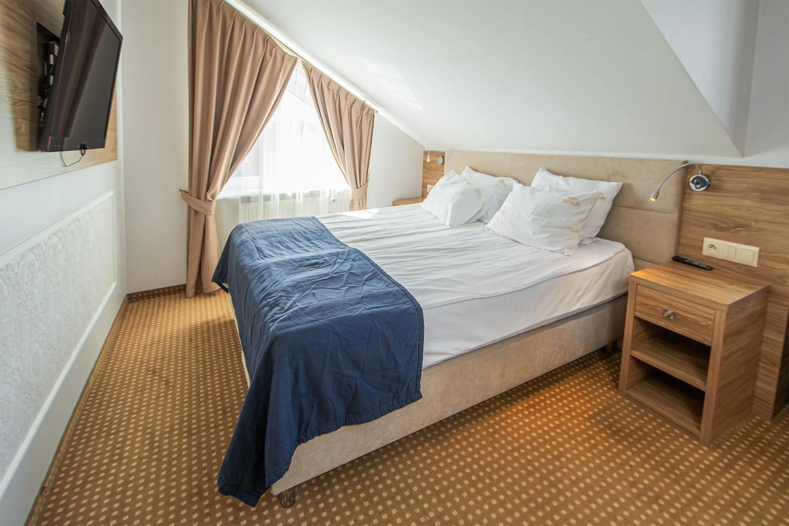 Photo of the whole room, Bed in Moris Boutique Beach Hotel