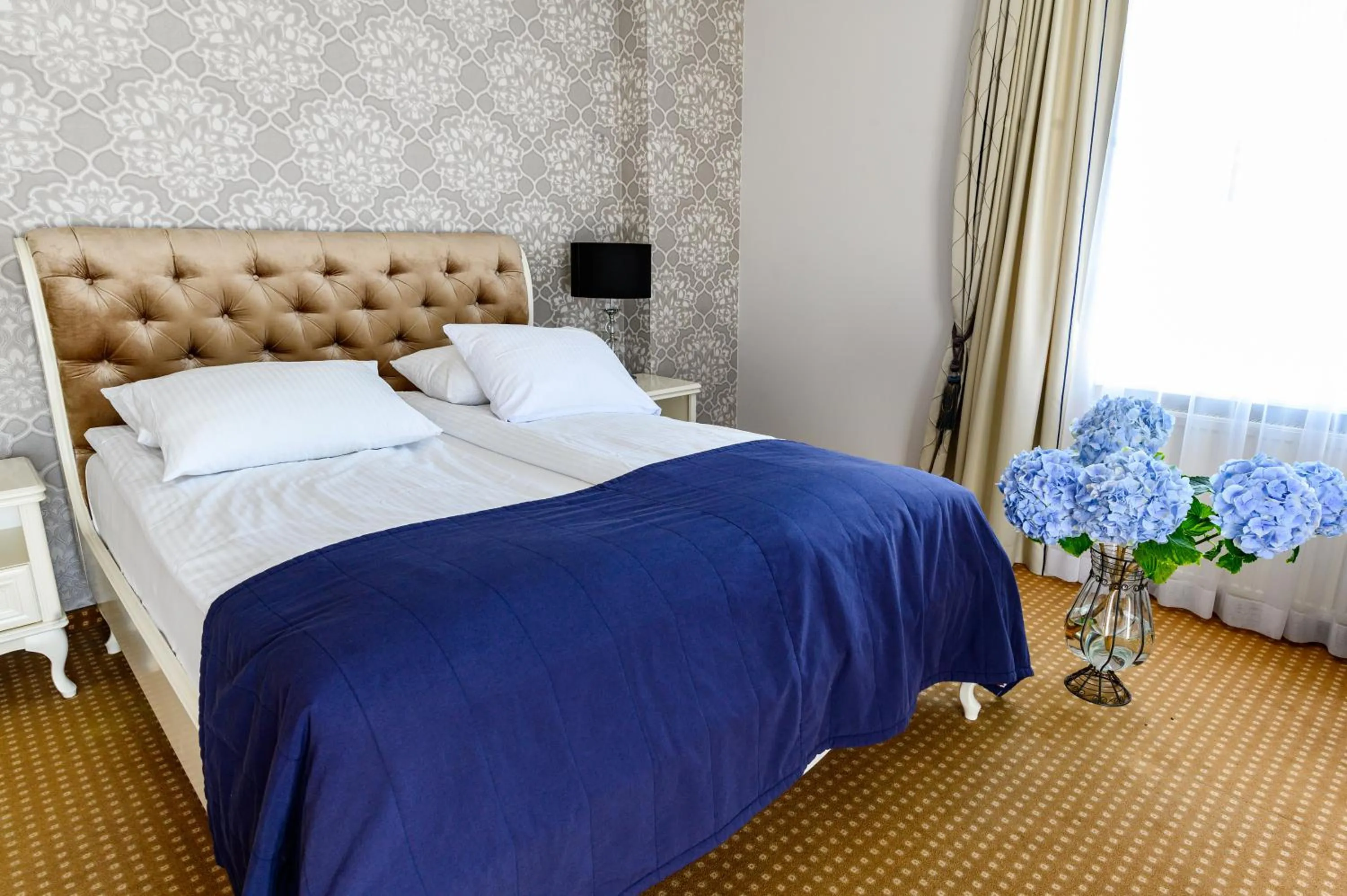 Photo of the whole room, Bed in Moris Boutique Beach Hotel