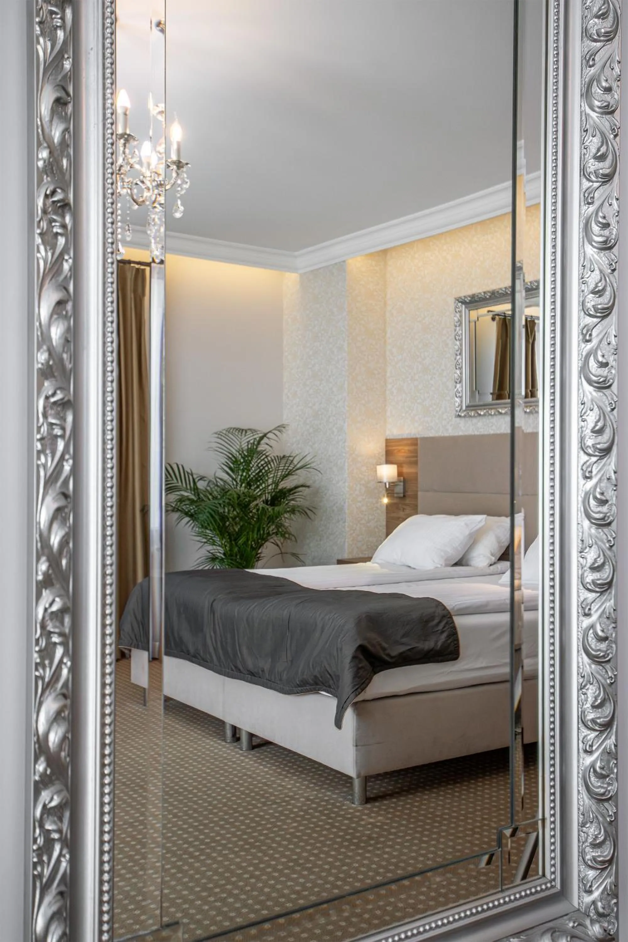 Bed in Moris Boutique Beach Hotel