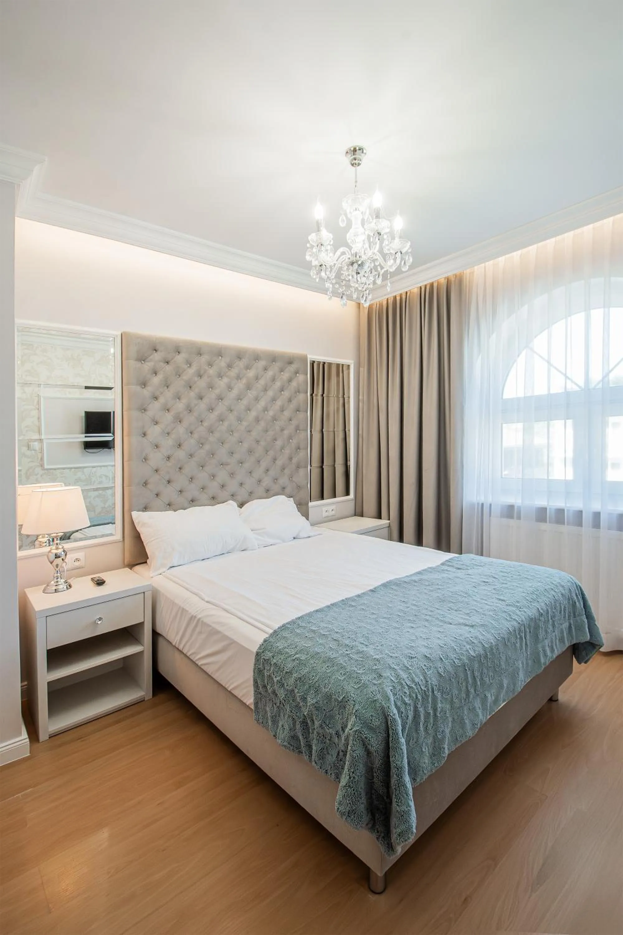 Bed in Moris Boutique Beach Hotel