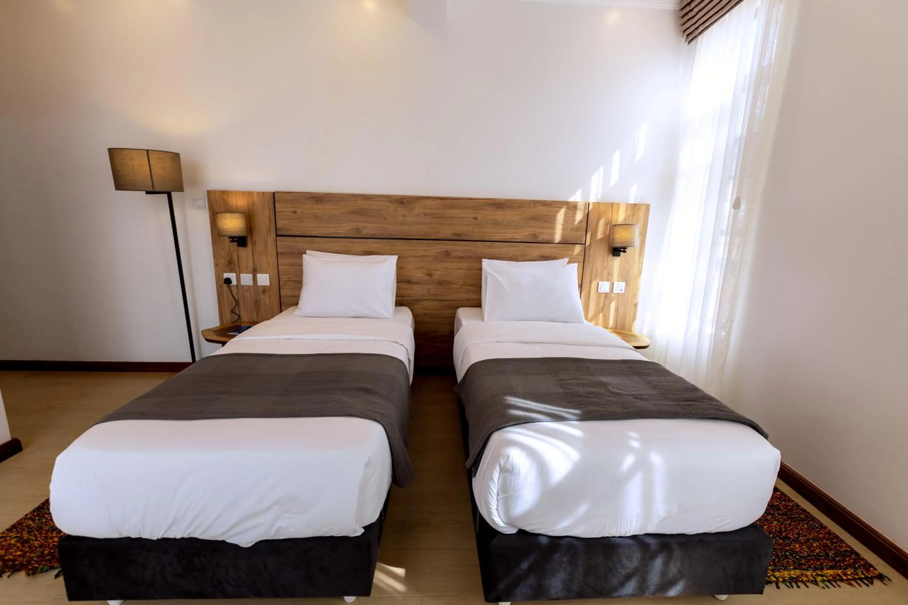 Bed in MAYA Residences Rwanda