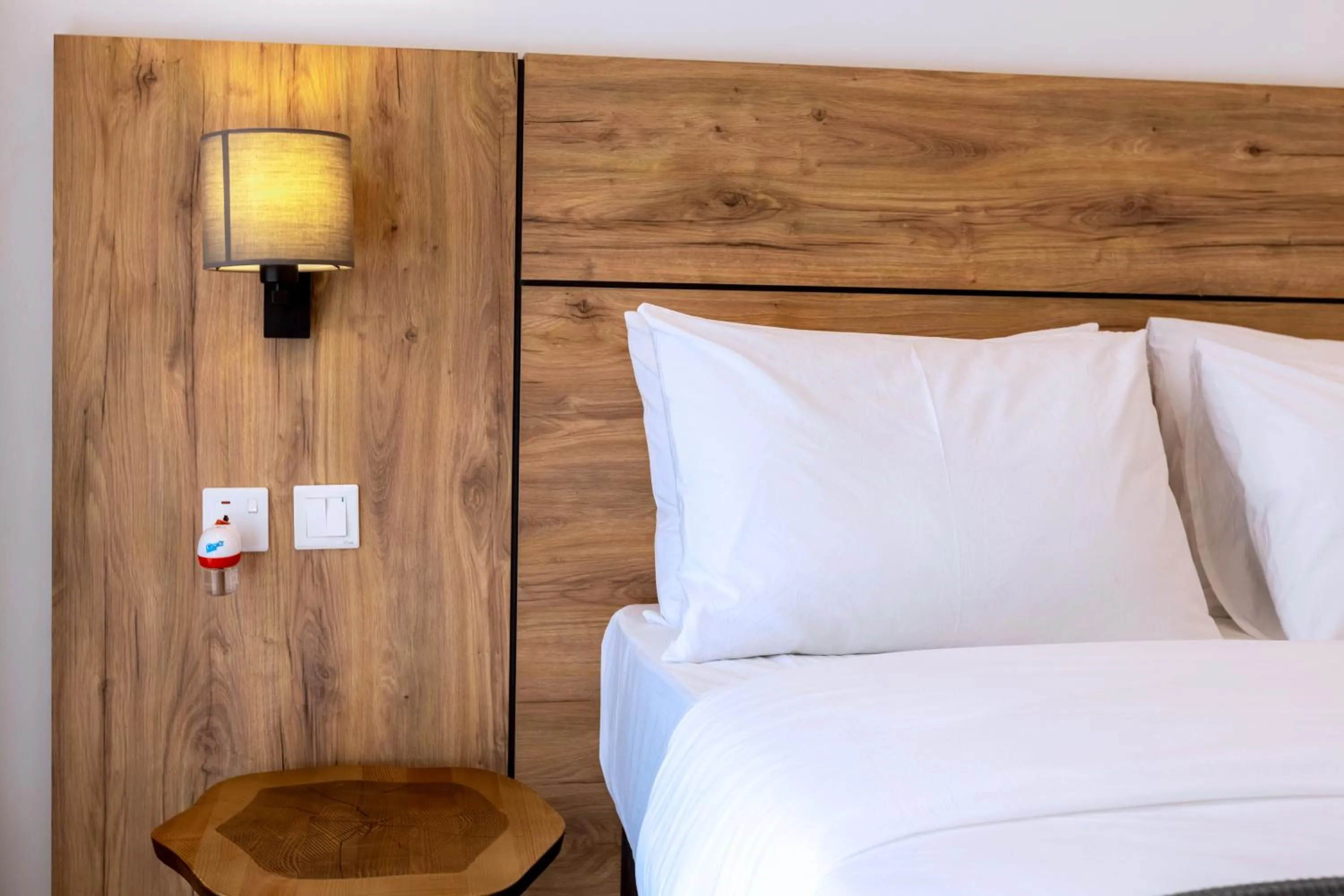 Bed in MAYA Residences Rwanda