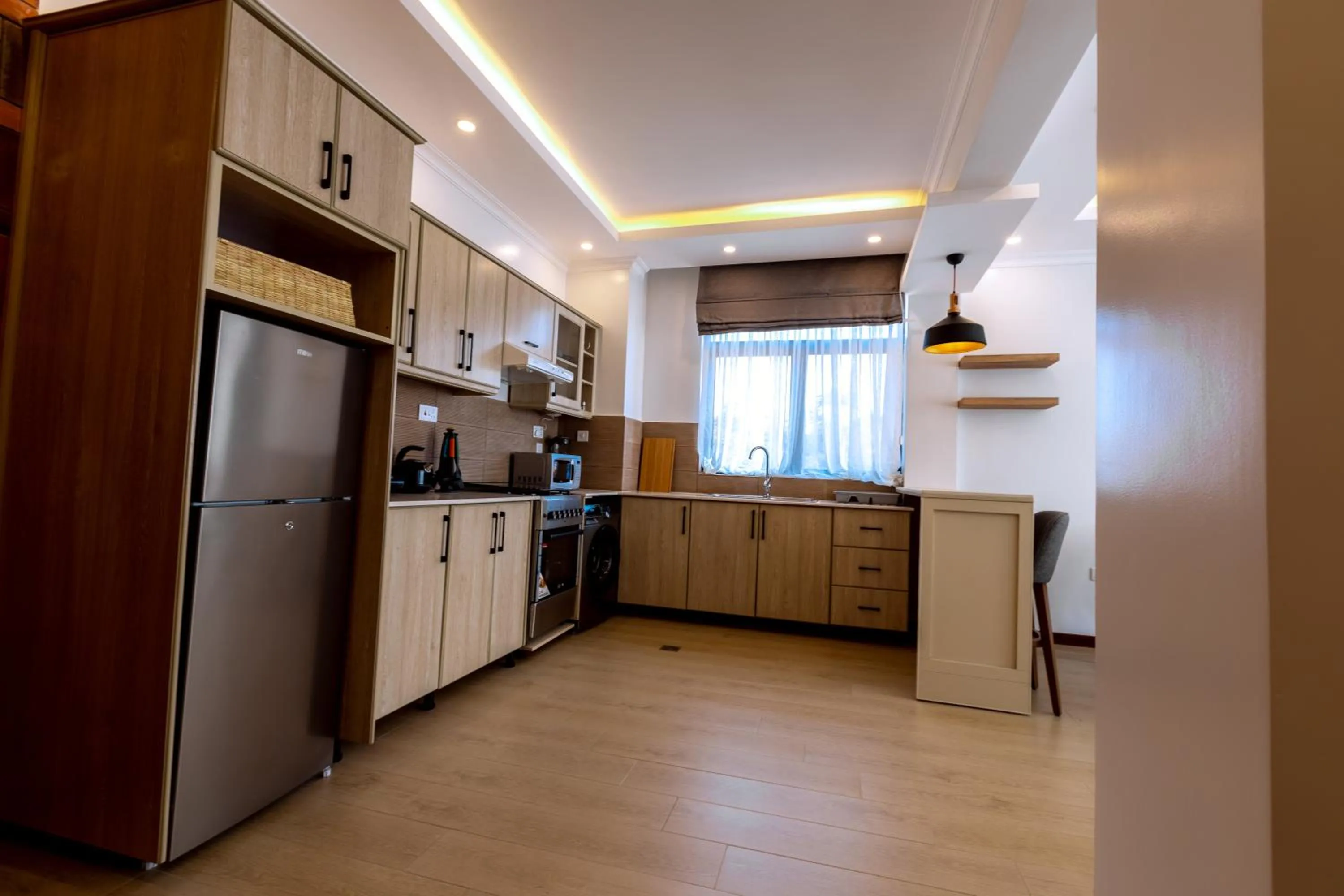 Kitchen or kitchenette in MAYA Residences Rwanda