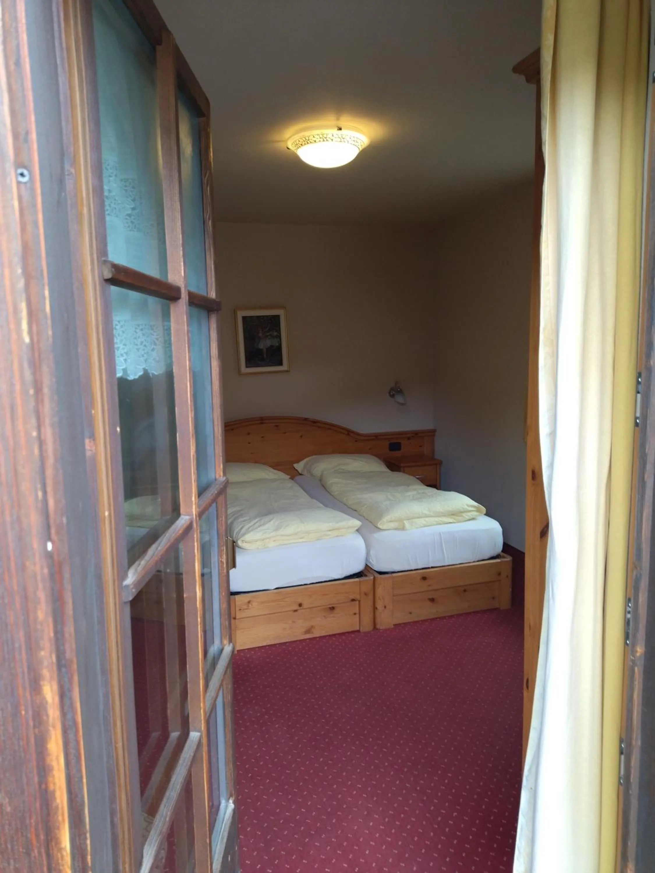 Photo of the whole room, Bed in Garni Baita Cecilia