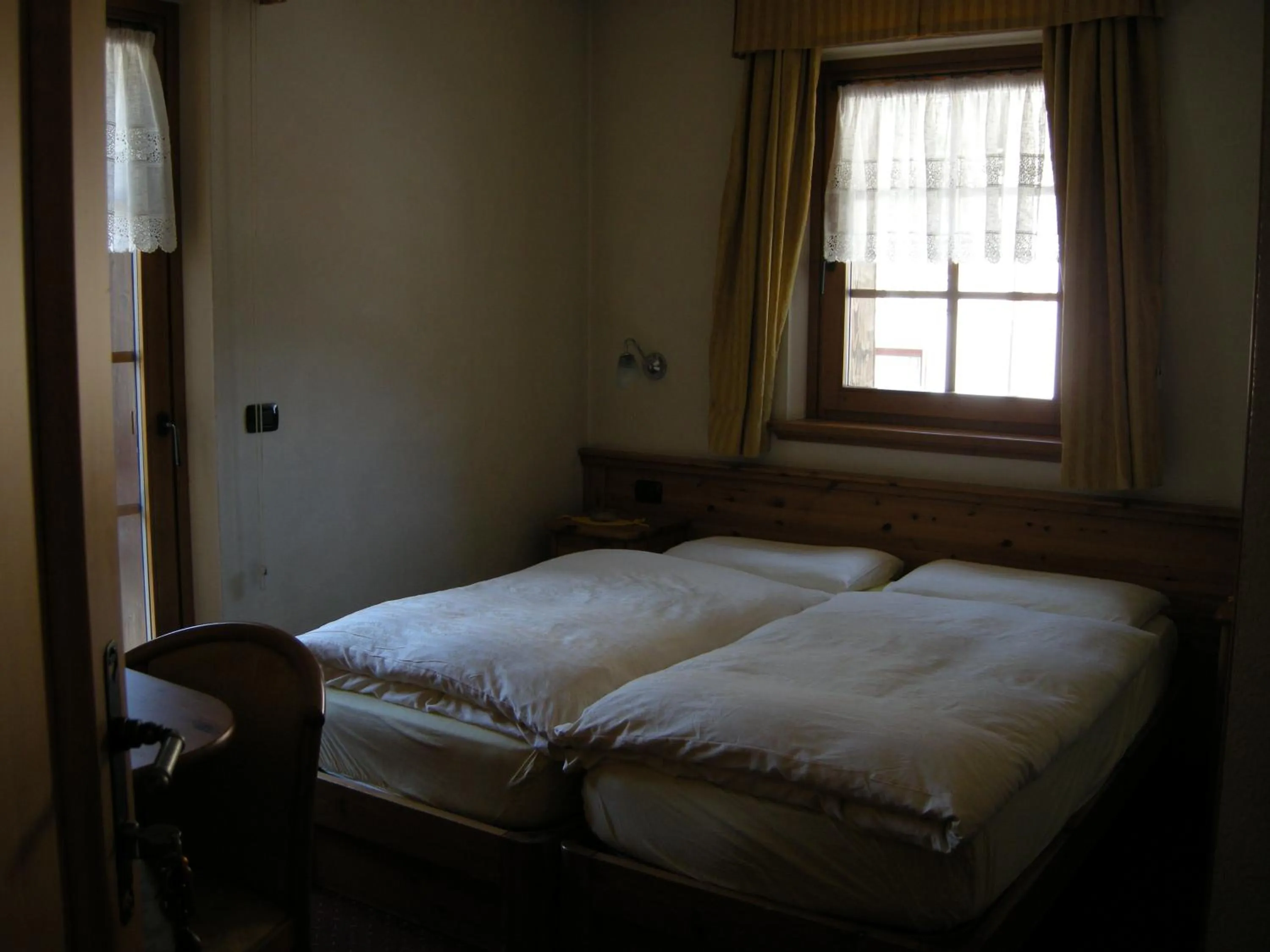 Photo of the whole room, Bed in Garni Baita Cecilia
