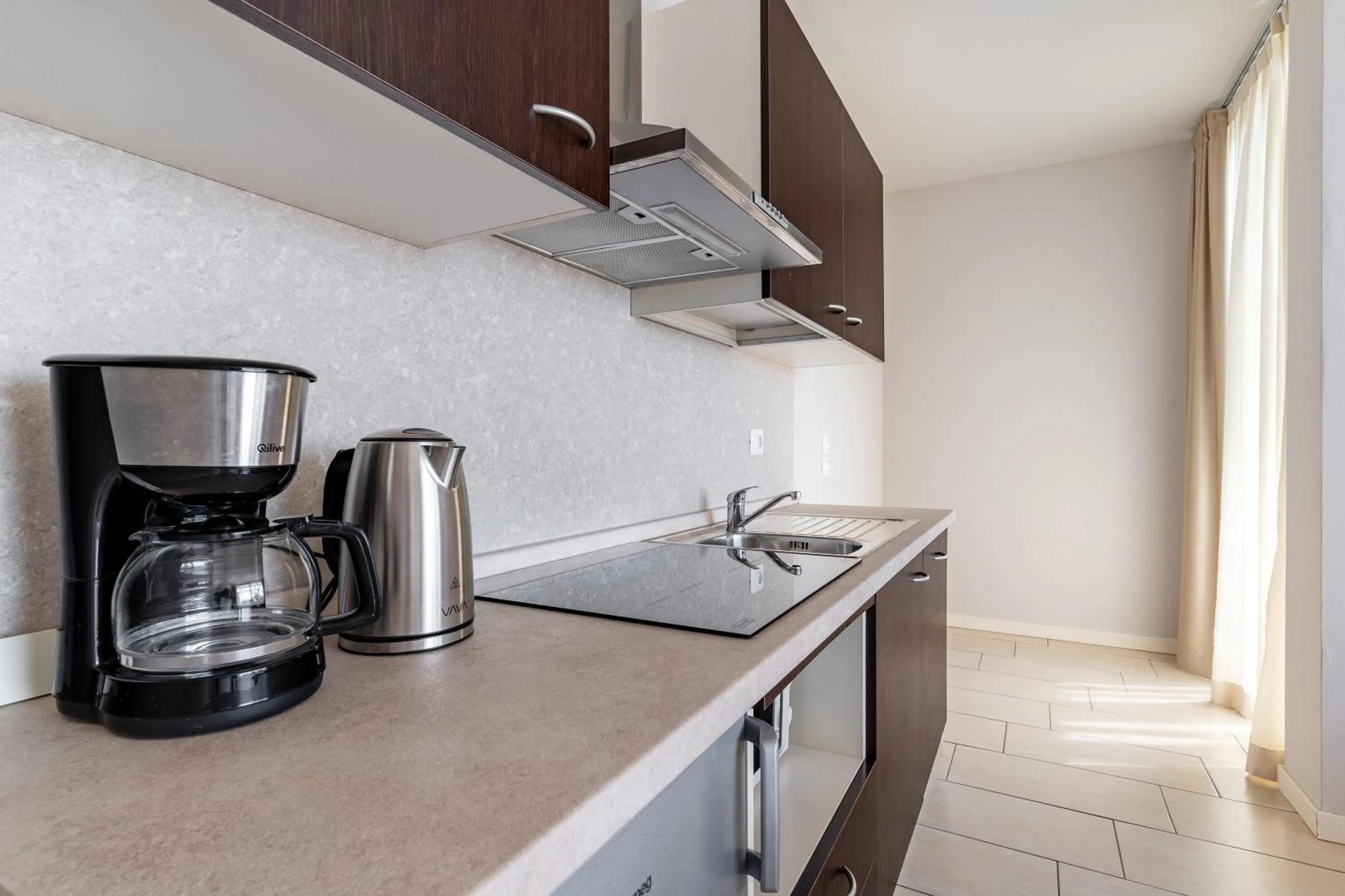 Kitchen or kitchenette in La Chioma di Berenice Garda Residence