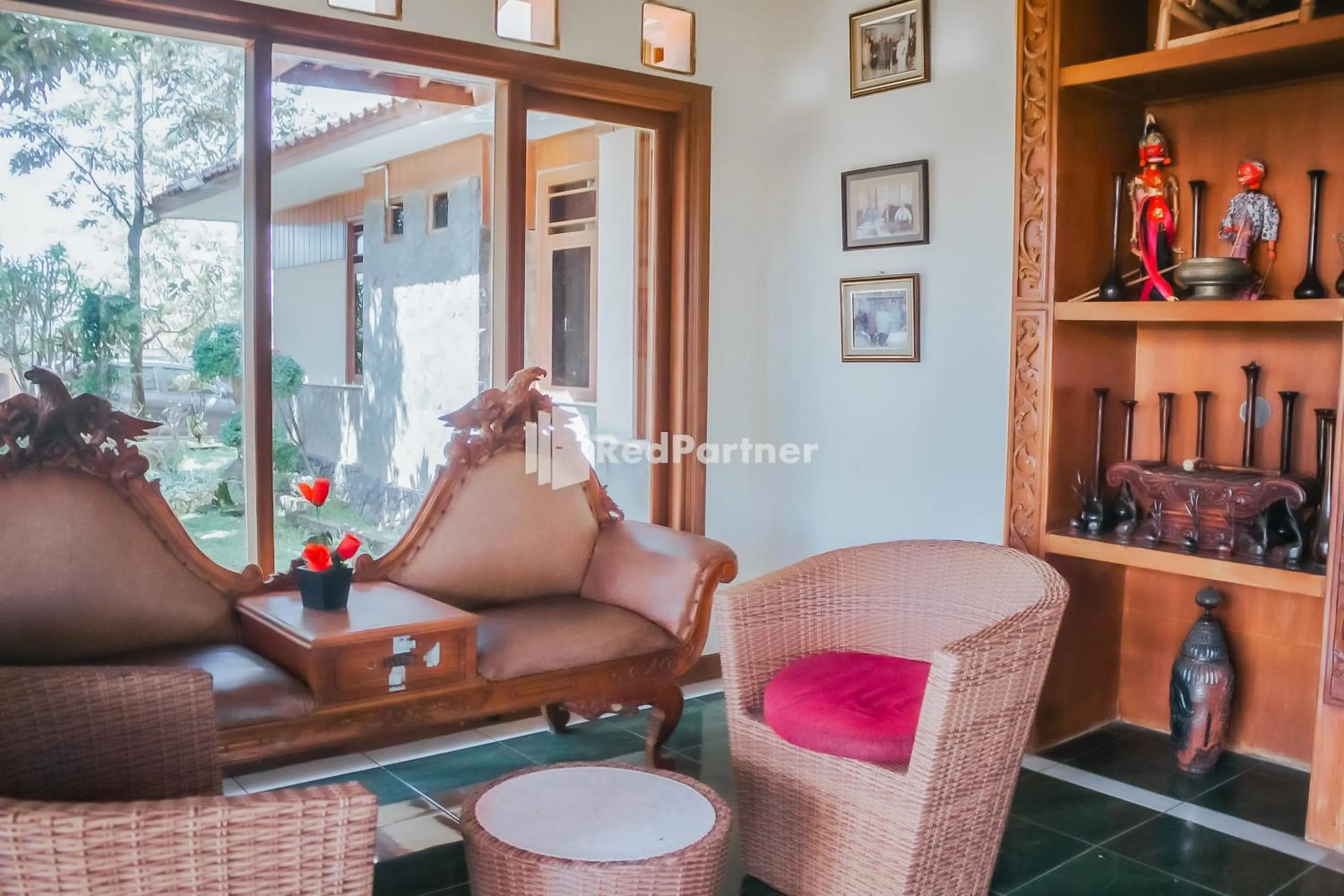 Seating area in Villa Mawar Adinda Kuningan Syariah RedPartner