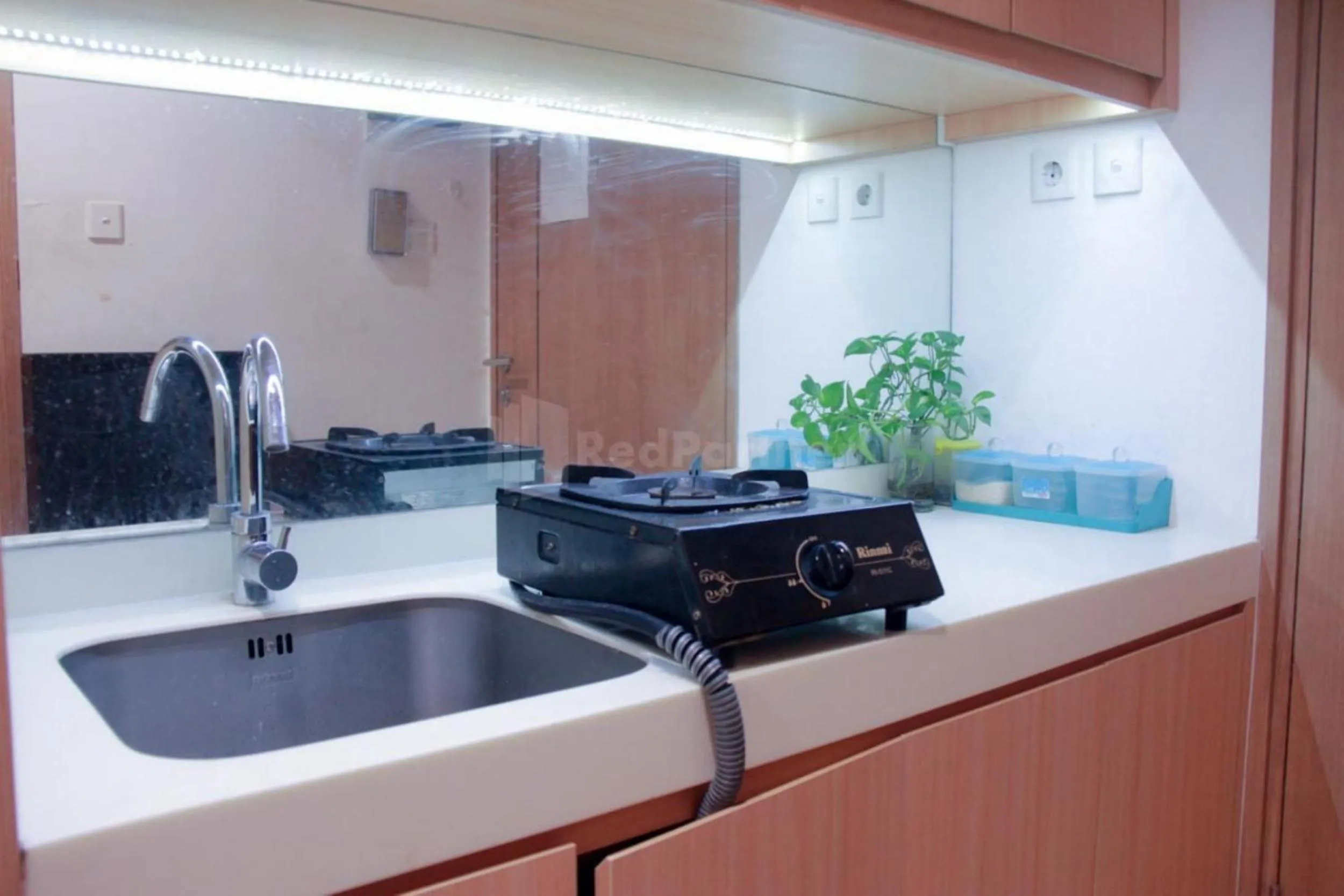 Kitchen or kitchenette in RedLiving Apartemen TreeParkCity - My Rooms Tower Alpine