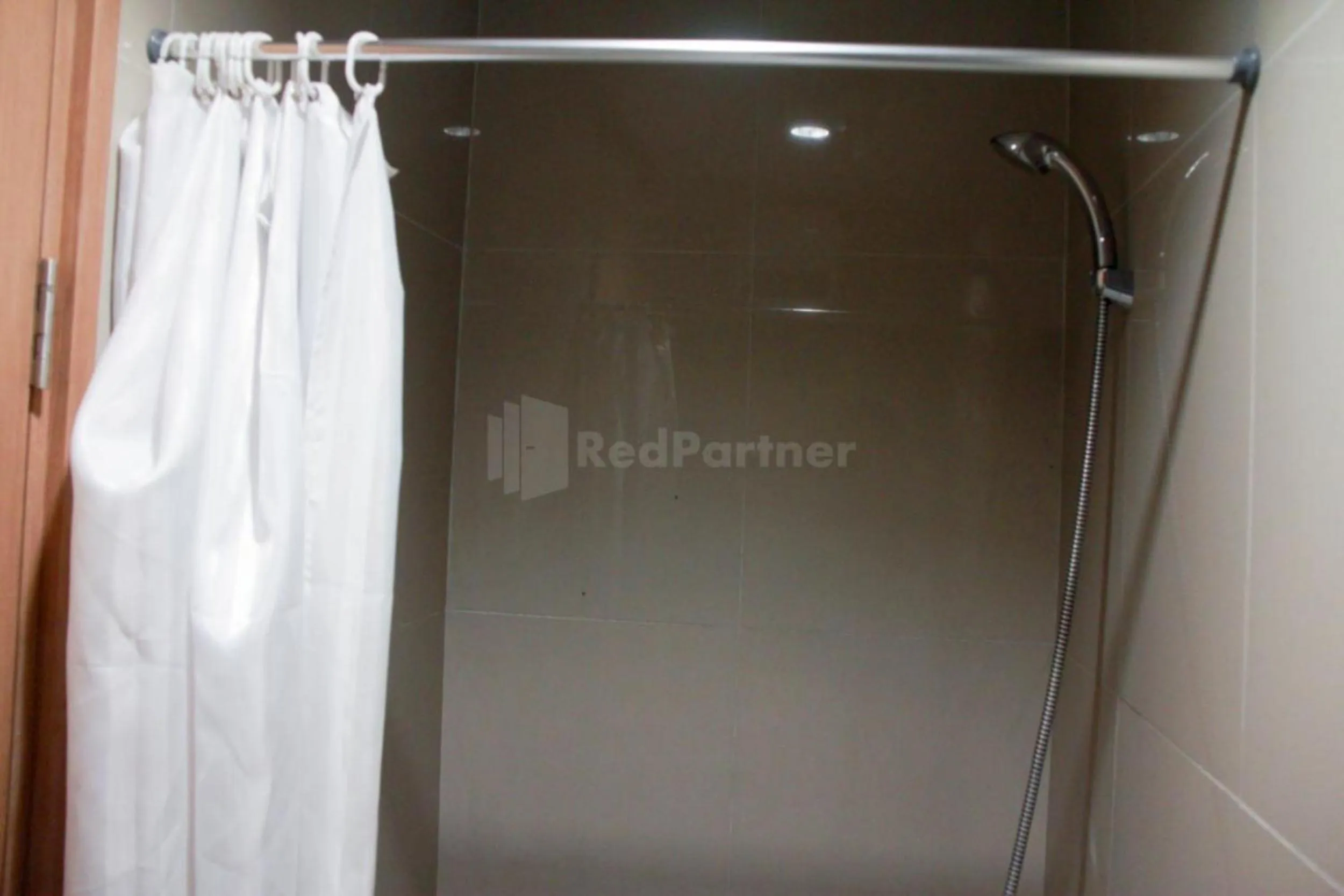 Bathroom in RedLiving Apartemen TreeParkCity - My Rooms Tower Alpine