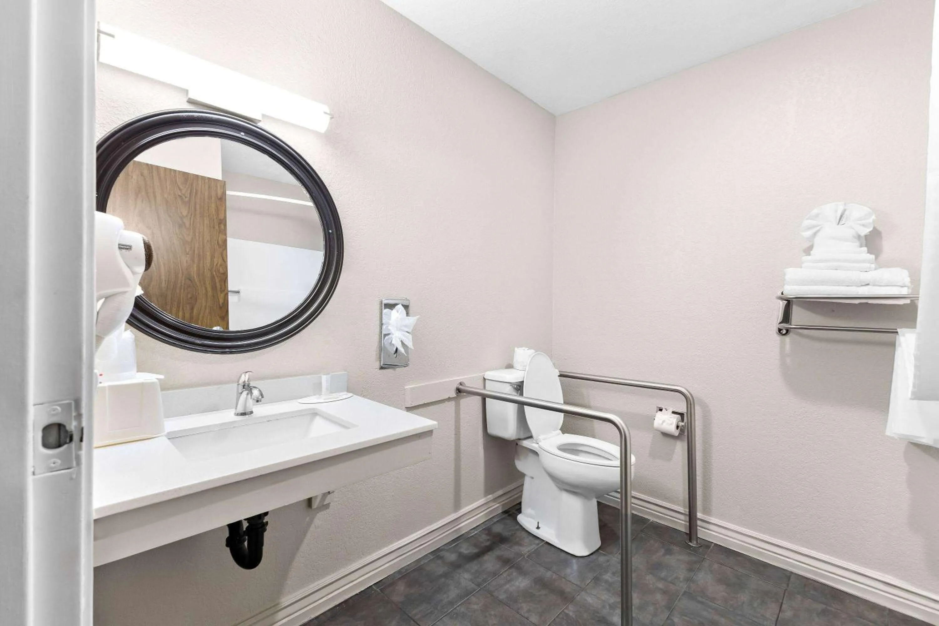 Bathroom in Super 8 by Wyndham Goodyear/Phoenix Area